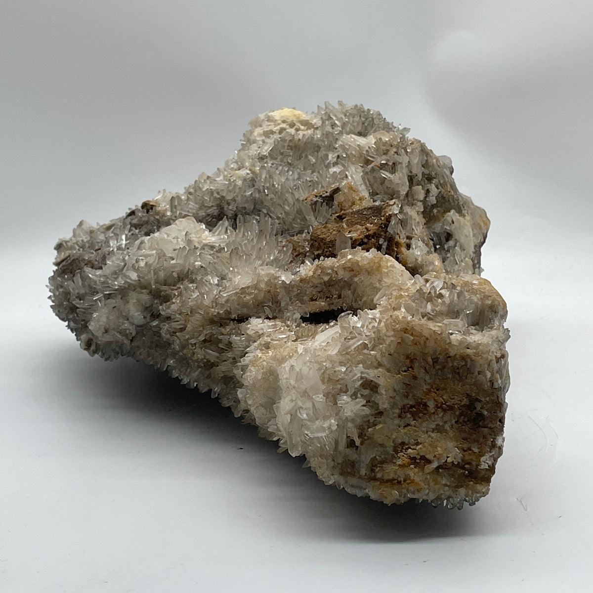 Natural Clear Quartz with Greyish and Yellow Rough Mountain Shaped with Wooden Stand Display 7,790.6g 250.0 by 130.0 by 365.0mm - Huangs Jadeite and Jewelry Pte Ltd