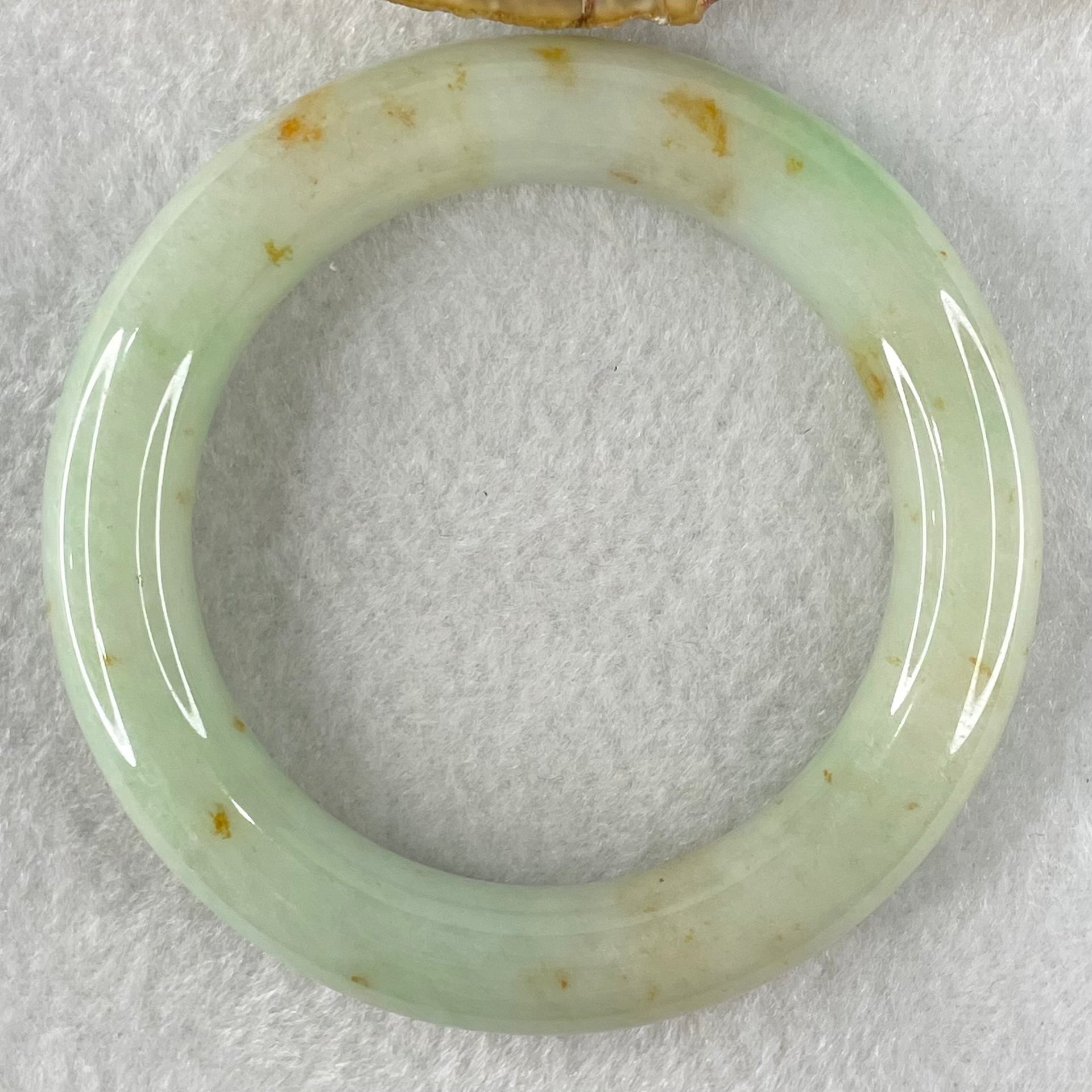 Type A Light Apple Green with Brownish Red Patches Jadeite Bangle 69.71g Internal Diameter 52.8mm 12.4 by 11.0mm (Close to Perfect) - Huangs Jadeite and Jewelry Pte Ltd