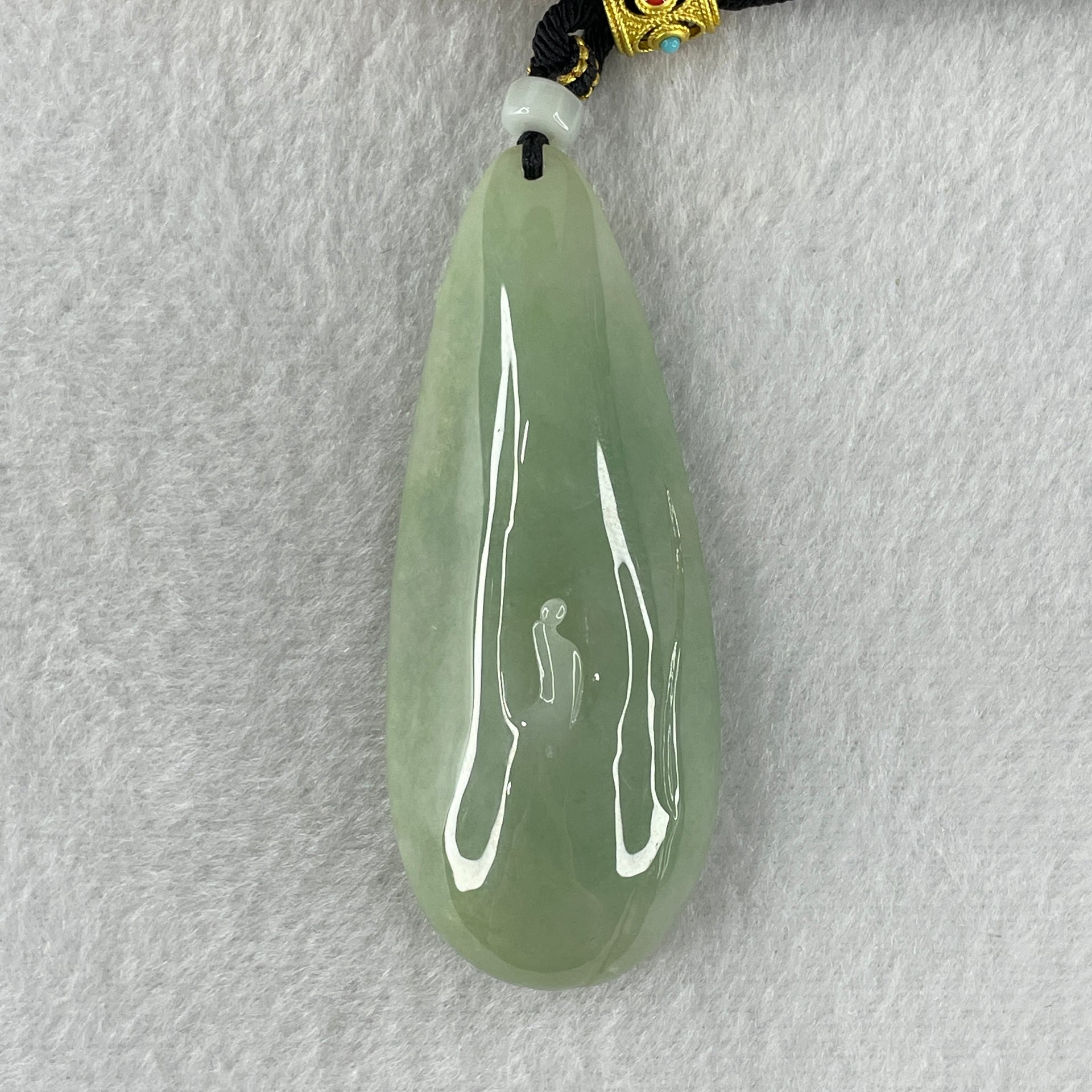 Natural Type A Light Green Jadeite People Seeking for Enlightenment Pendant 48.13g 70.6 by 28.5 by 13.8mm - Huangs Jadeite and Jewelry Pte Ltd