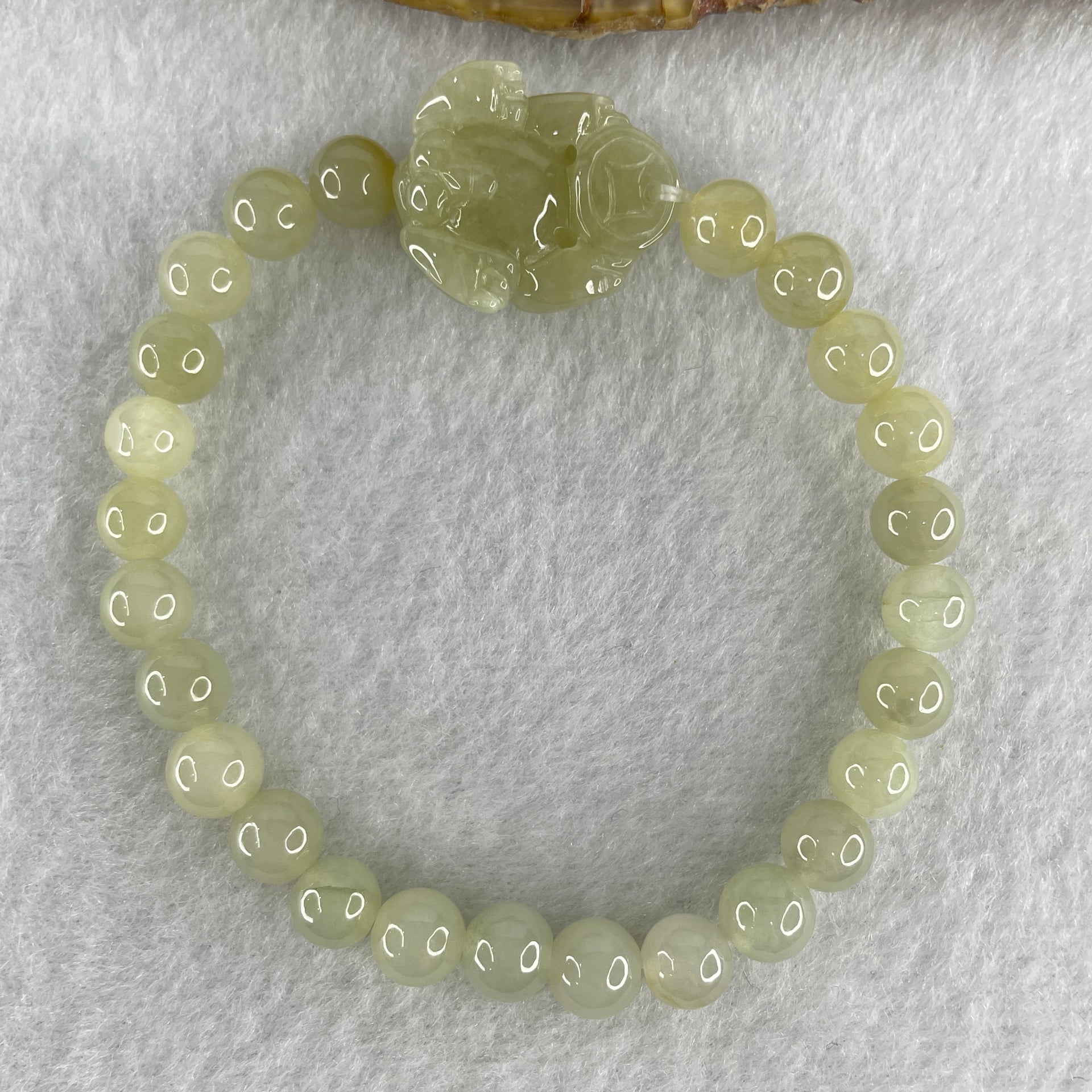 Special Edition Natural Type A Light Green with Yellow Jadeite Male Pixiu 20.9 by 17.7 by 13.0mm with Jadeite Beads Bracelet 22.18g 16cm 7.0mm 25 Beads - Huangs Jadeite and Jewelry Pte Ltd