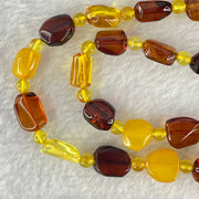 Natural Mixed Color Amber Beads Necklaces 18.16g 60cm 18.8 by 10.2 by 4.8mm, 11.2 by 7.1 by 5.5mm 35pcs - Huangs Jadeite and Jewelry Pte Ltd