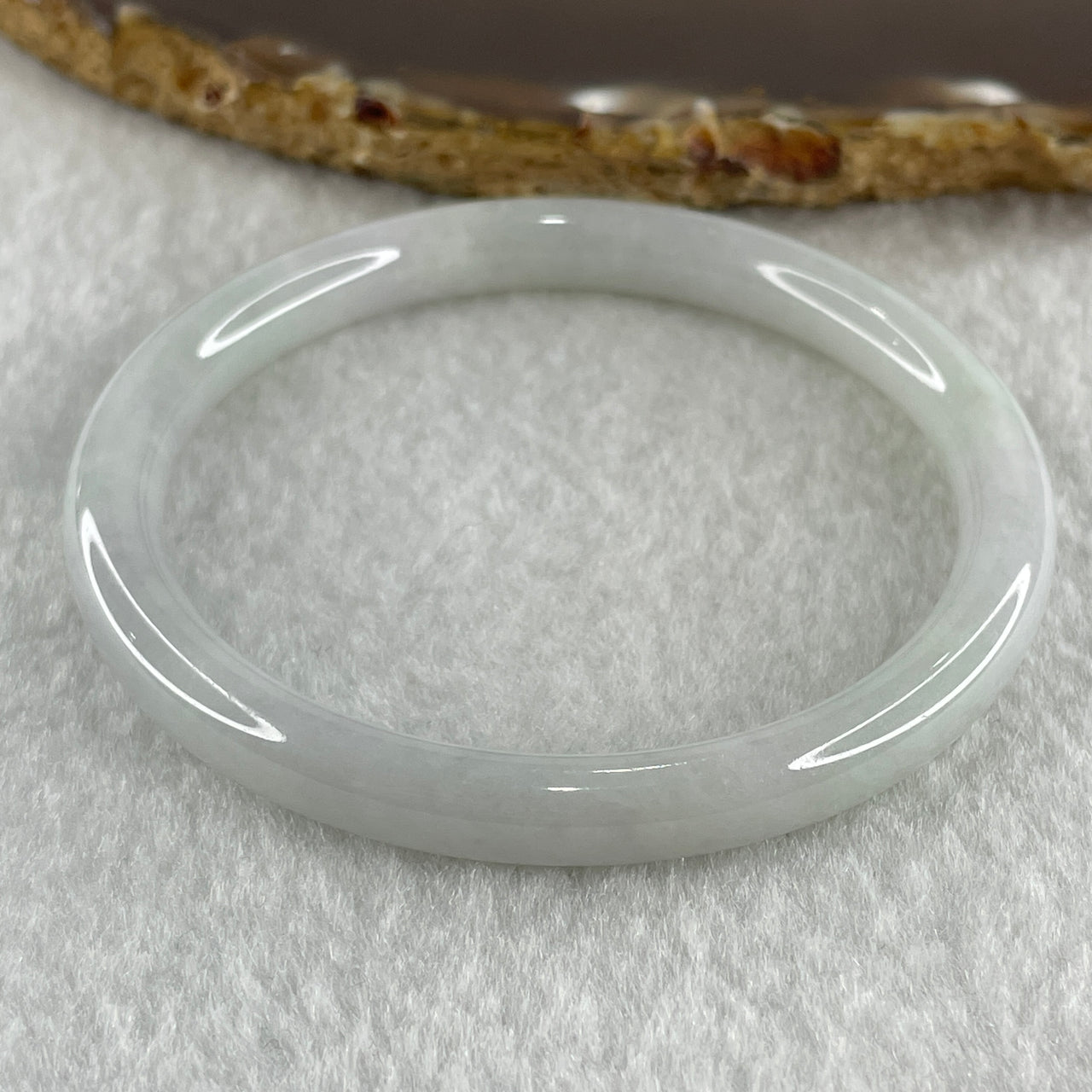 Type A Natural Light Green with Faint Lavender Jadeite Bangle 25.54g Internal Diameter 55.9mm 7.6 by 6.9mm (Very Slight Internal Lines) - Huangs Jadeite and Jewelry Pte Ltd