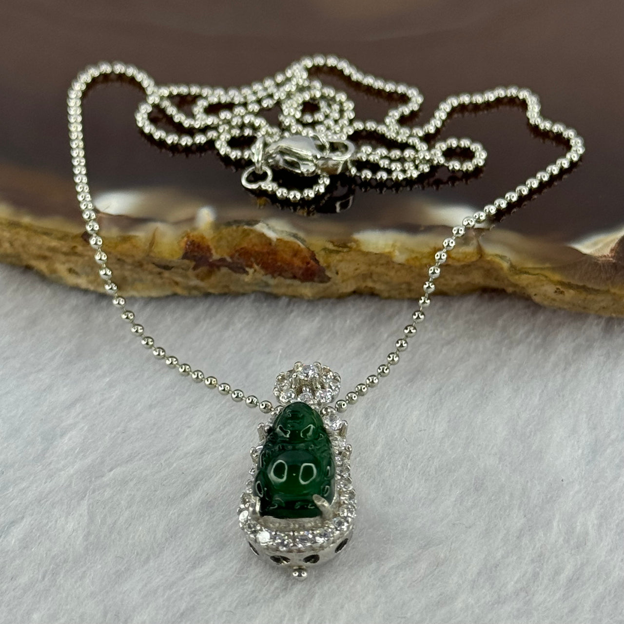 Type A Icy Green Omphasite Jadeite Milo Buddha 12.8 by 7.1 by 3.5mm with Crystals in S925 Sliver Necklace 2.87g - Huangs Jadeite and Jewelry Pte Ltd
