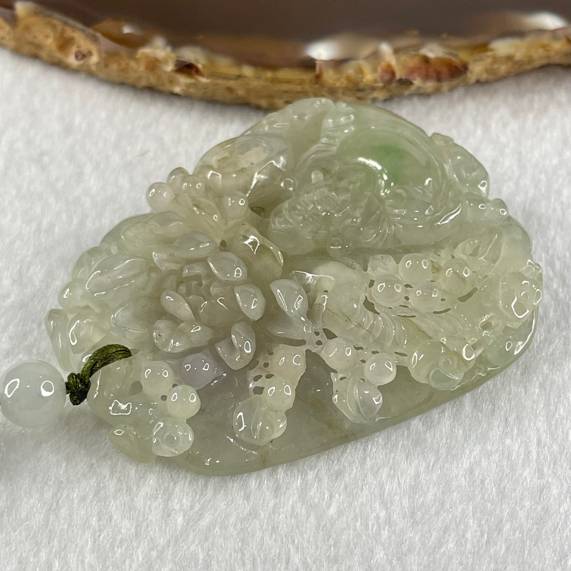 Grandmaster Type A Faint Lavender with Light Green Jadeite Cai Shen Ye with Prosperity Flowers and Bird 天宫赐福 Pendant 62.62g 56.88 by 46.94 by 13.07mm With NGI Cert 82838783 - Huangs Jadeite and Jewelry Pte Ltd