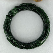 Type A Translucent to Opaque Old Mine Spicy Green Jadeite Dragon Bangle Internal Diameter 56.30mm 374.20cts 74.75g 16.0 by 12.5mm With NGI Cert 32885979 (Slight Internal Lines) - Huangs Jadeite and Jewelry Pte Ltd