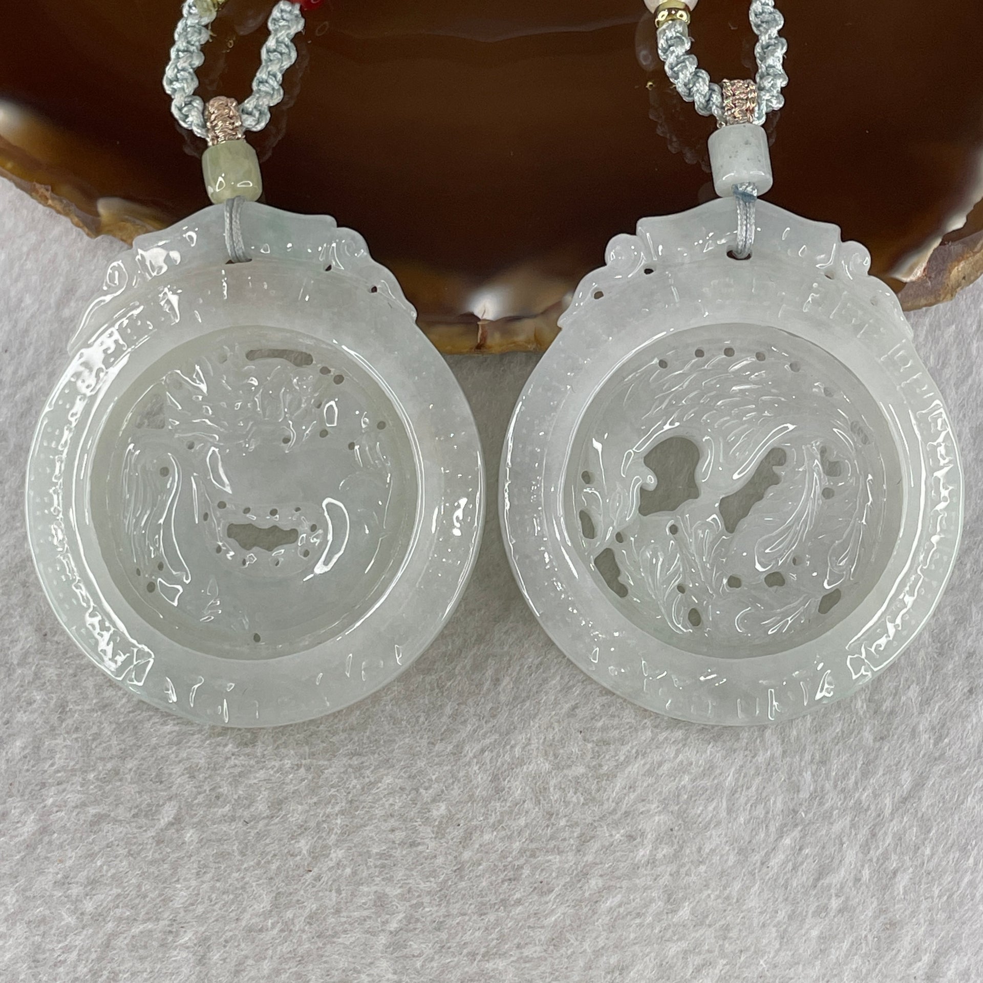 Grand Master Natural Colorless to Fain Green Jadeite Dragon and Phoenix Pendant 60.88g 54.8 by 47.9 by 6.0mm - Huangs Jadeite and Jewelry Pte Ltd
