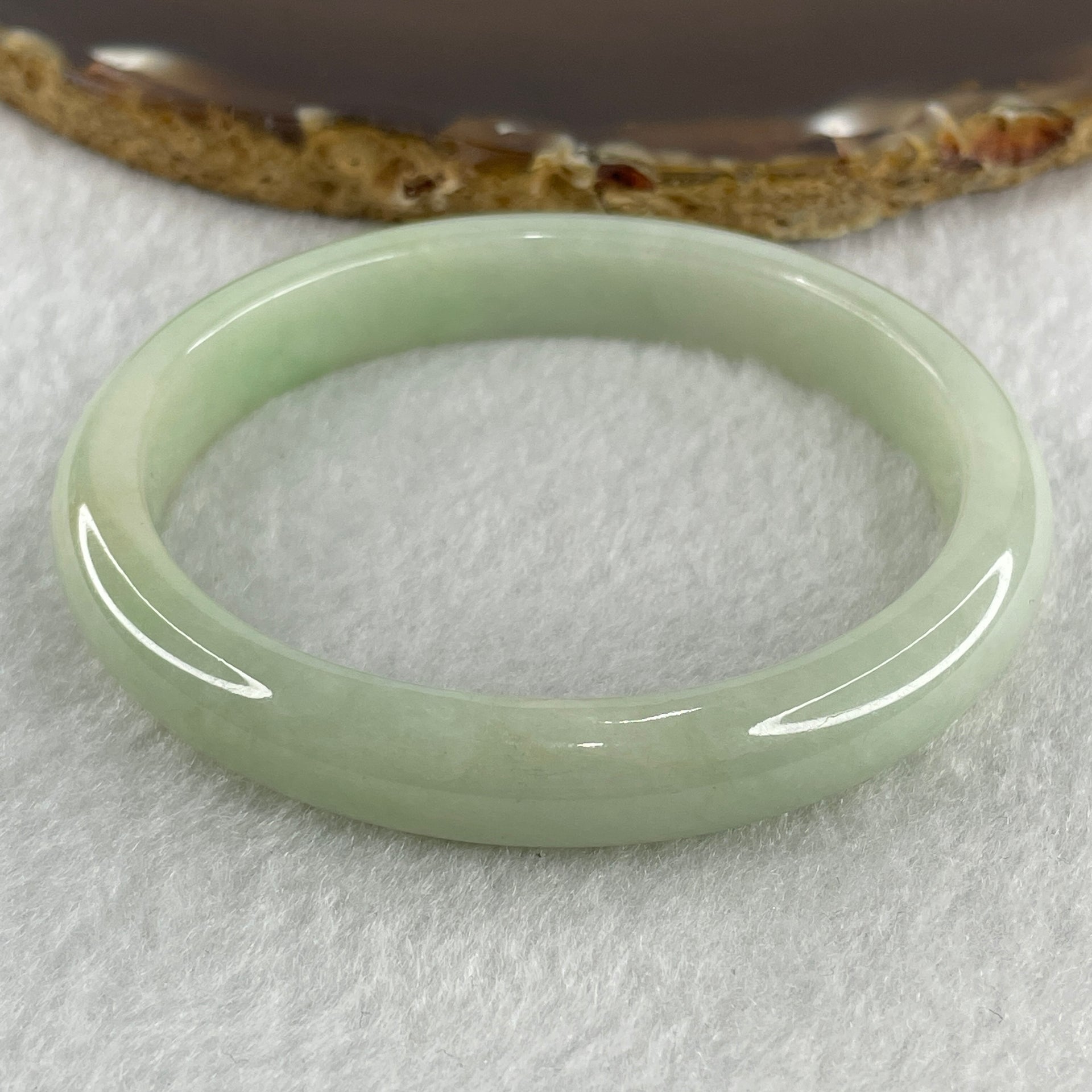 Natural Type A Light Apple Green Jadeite Oval Bangle 32.89g Inner Diameter 55.1mm Thickness 9.9 by 6.8mm (Close to Perfect) - Huangs Jadeite and Jewelry Pte Ltd