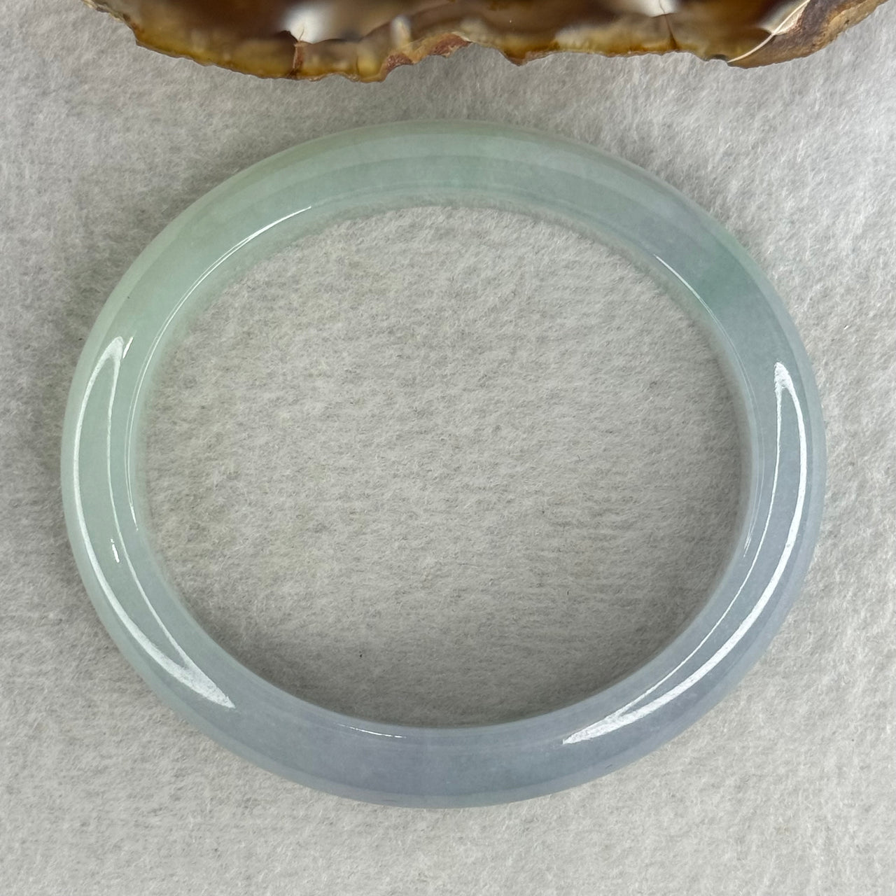 Type A Jelly Faint Green Faint Lavender Jadeite Oval Bangle 48.77g Inner Diameter 57.7mm 12.1 by 8.0mm with NGI Cert No. 32888362 (Internal Line) - Huangs Jadeite and Jewelry Pte Ltd
