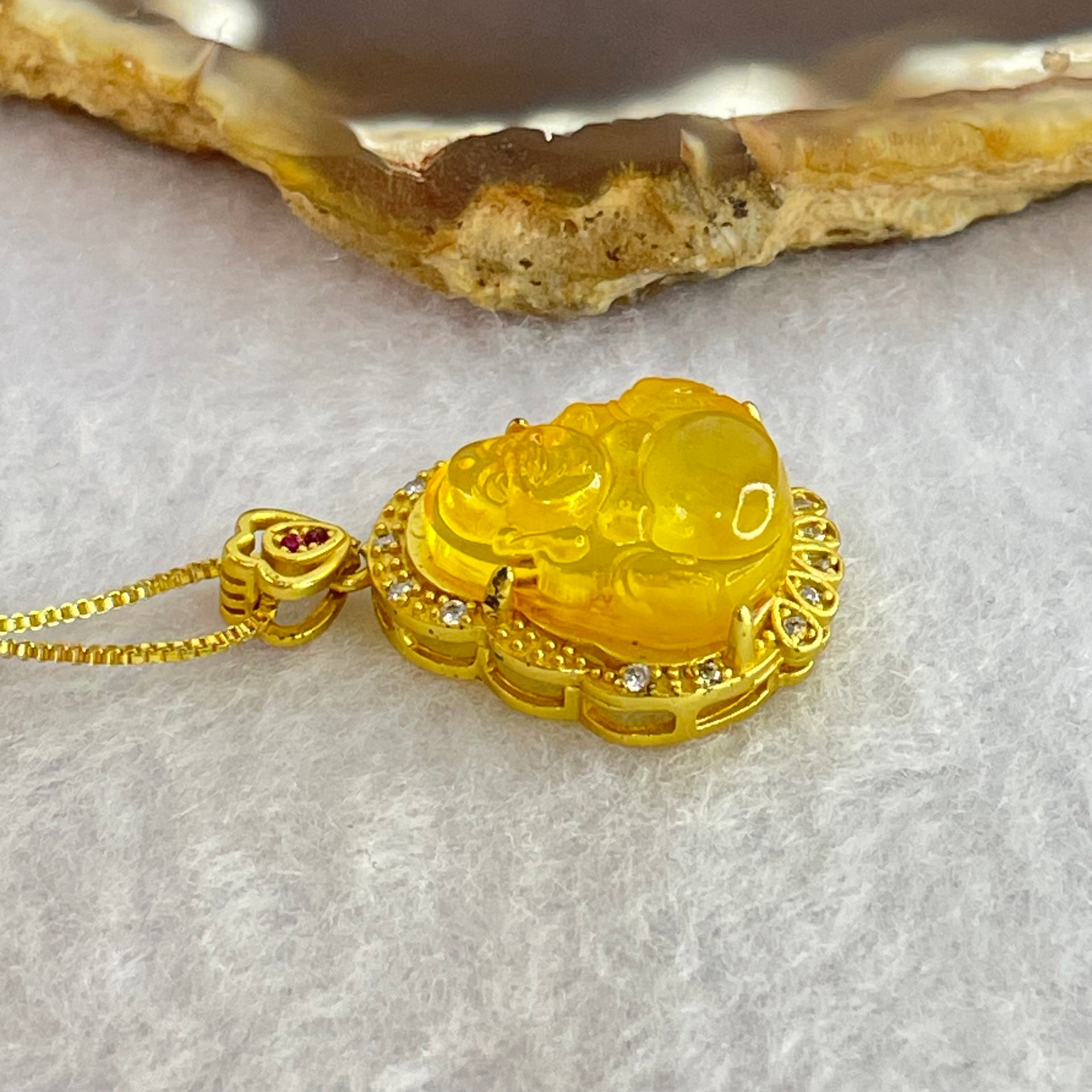 Natural Yellow Amber Milo Buddha Pendent in Gold Color Silver Necklace 4.44g 15.7 by 14.3 by 5.0mm - Huangs Jadeite and Jewelry Pte Ltd