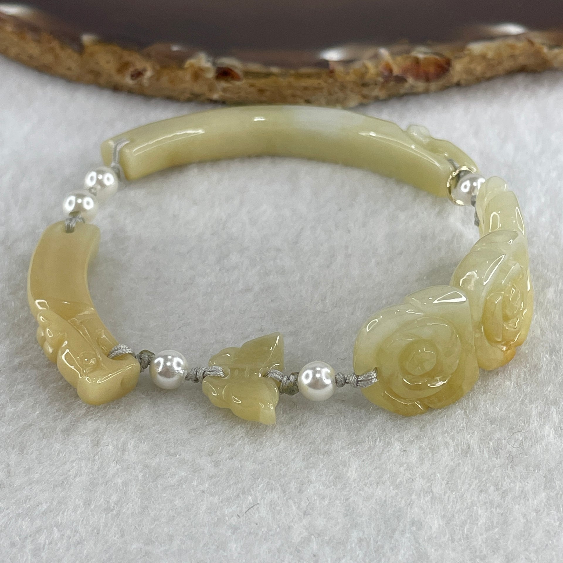 Natural Type A Light Yellowish with Light Green Jadeite Flowers with Dragon Head and Butterfly Bracelet 25.67g 7.2 by 8.4mm - Flower 40.4 by 16.5 by 6.1mm - Huangs Jadeite and Jewelry Pte Ltd