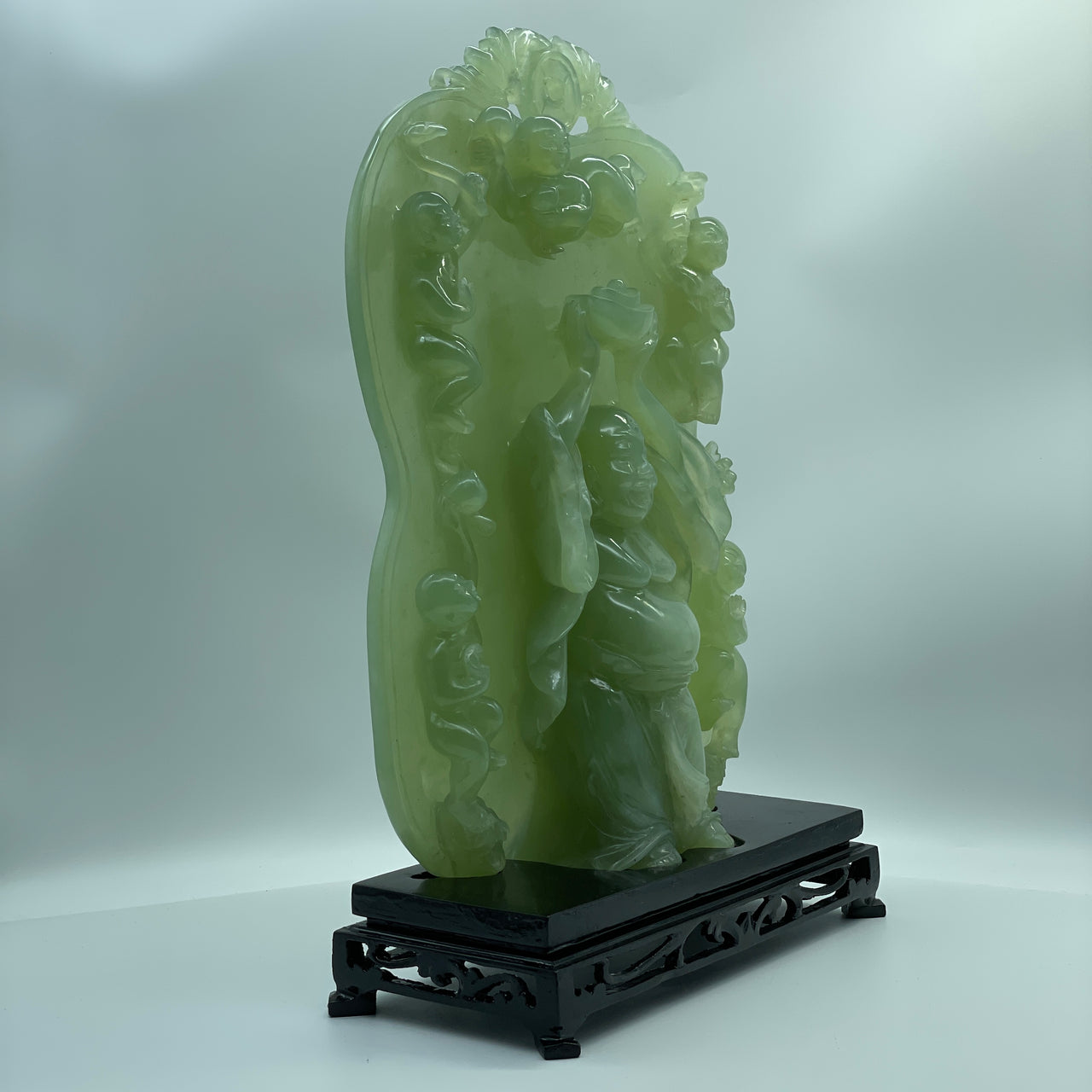 Natural Light Green Serpentine Milo Buddha with 5 Tong Zi Golden Boy with 5 Treasures and Bats with Coin Display 3,705.0g 240.0 by 110.0 by 360.0mm