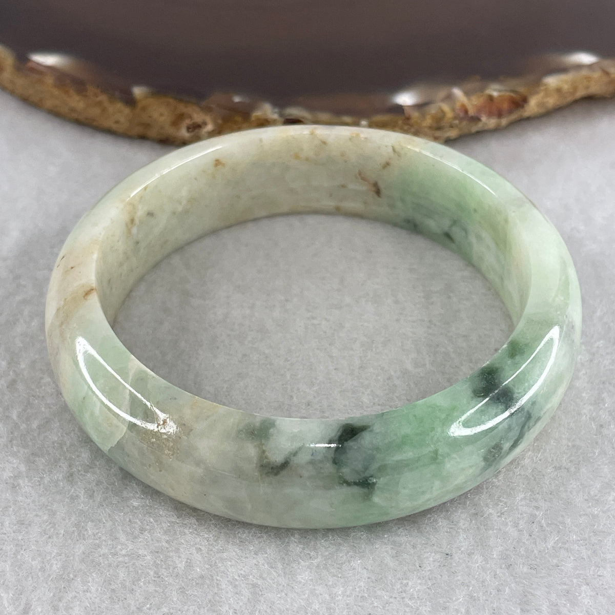 Natural Type Green with Reddish Brown Piao Hua Jadeite Bangle 62.49g Inner Diameter 55.5mm 15.4 by 8.0mm (Slight Internal Line) - Huangs Jadeite and Jewelry Pte Ltd