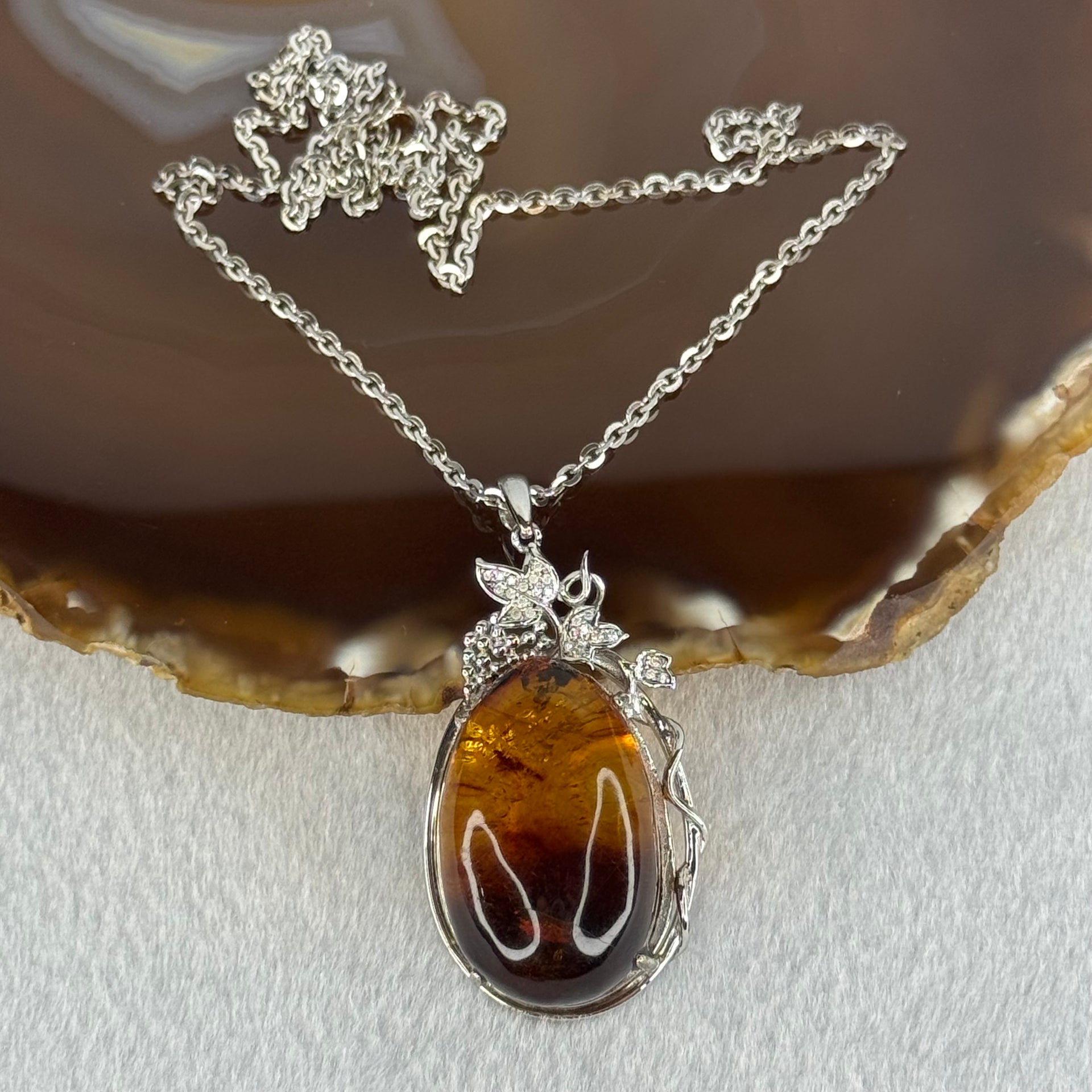 Natural Amber with Cubic Zirconia in S925 Sliver Necklace 15.05g 30.8 by 19.4 by 15.1mm - Huangs Jadeite and Jewelry Pte Ltd