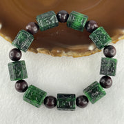 Type A Old Mine Spicy Green Jadeite Om Mani Padme Hum Barrel with Wood Beads Bracelet 55.97g 18cm 12.2 by 13.8mm - Huangs Jadeite and Jewelry Pte Ltd