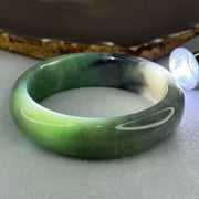 Type A Translucent Light Green with Patches of Faint Grey and Greyish Black Jadeite Bangle Internal Diameter 57.75mm 404.45cts 81.28g 17.3 by 9.0mm With NGI Cert No 32885808 (Very Slight Internal Lines) - Huangs Jadeite and Jewelry Pte Ltd