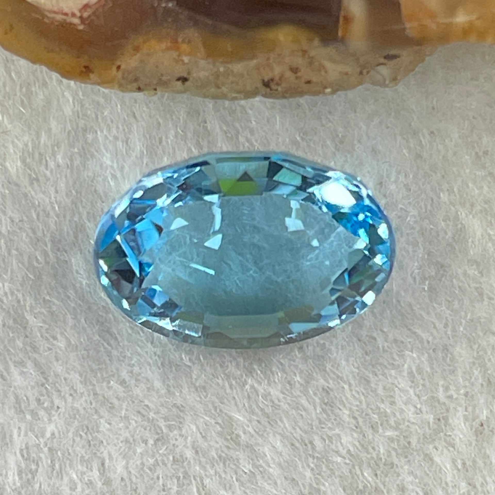 Natural Sky Blue Topaz Oval Shape 9.48ct 14.3 by 11.2 by 7.5mm - Huangs Jadeite and Jewelry Pte Ltd
