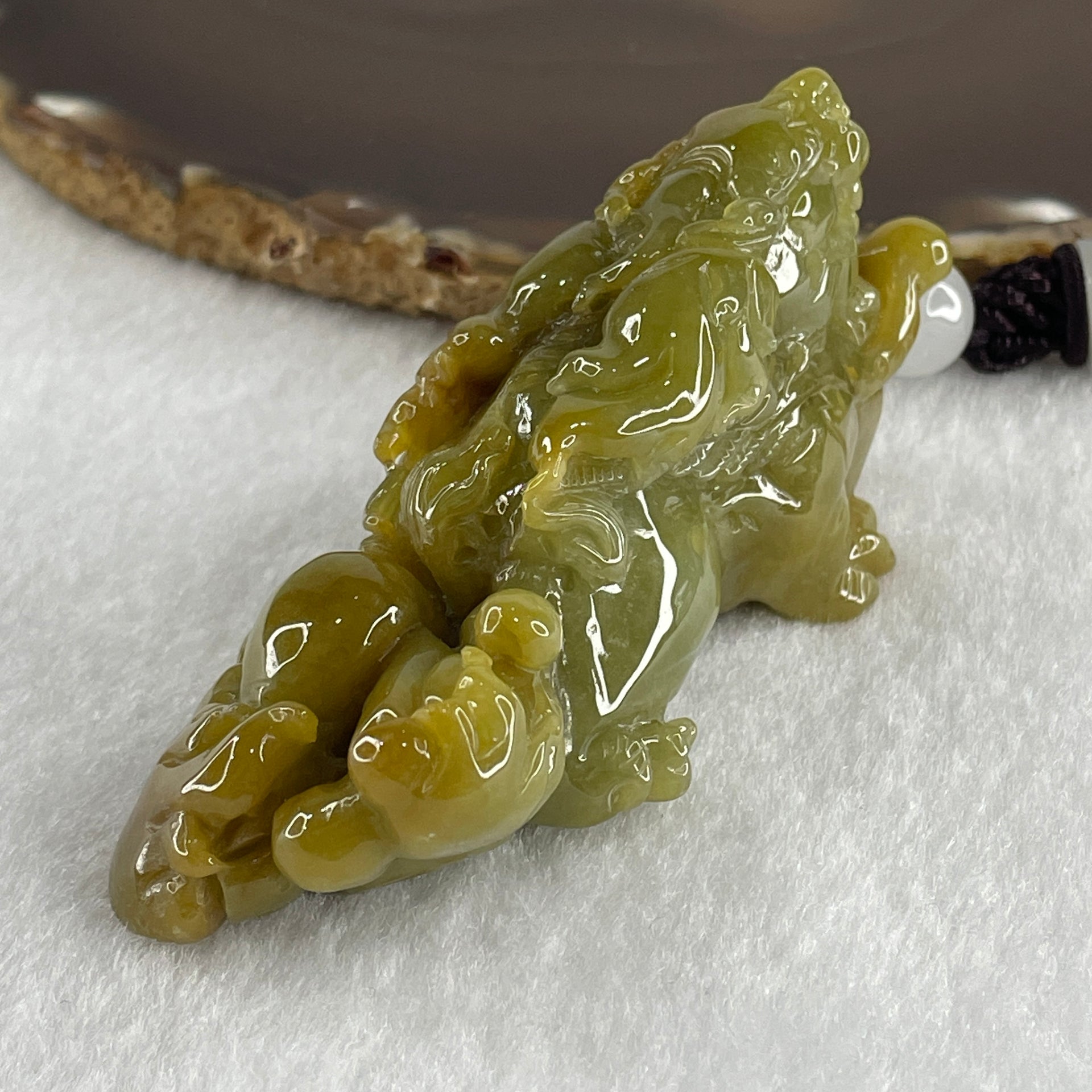 Grand Master Type A Yellow with Green Jadeite Flying Pixiu Pendant 102.1g 34.4 by 33.0 by 20.2mm - Huangs Jadeite and Jewelry Pte Ltd