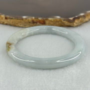 Type A Sky Blue with Green and Brown Patch Jadeite Oval Bangle Internal Diameter 58.0mm 32.09g 7.4 by 7.9mm (External Rough with Internal Lines) - Huangs Jadeite and Jewelry Pte Ltd