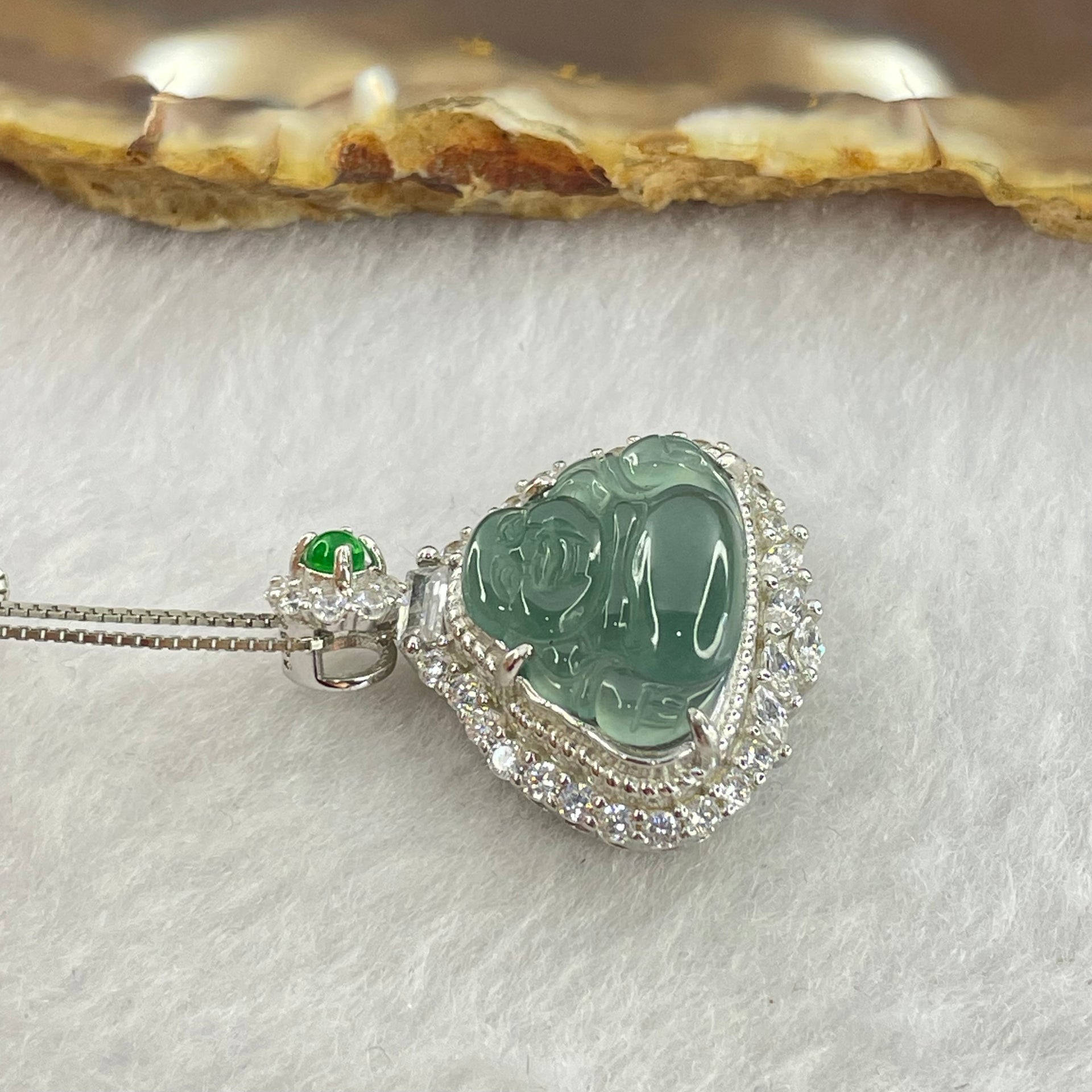 Type A Icy Blueish Green Jadeite Milo Buddha Pendent with Crystals in S925 Sliver Setting and Chain 3.39g 12.8 by 16.0 by 3.0mm - Huangs Jadeite and Jewelry Pte Ltd