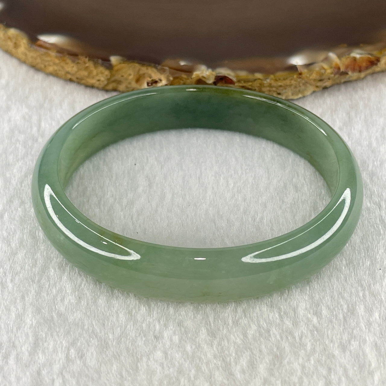 Natural Type A Jelly Full Green Jadeite Oval Bangle 31.63g Inner Diameter 54.9mm 11.6 by 5.6mm (Slight Internal Lines) - Huangs Jadeite and Jewelry Pte Ltd