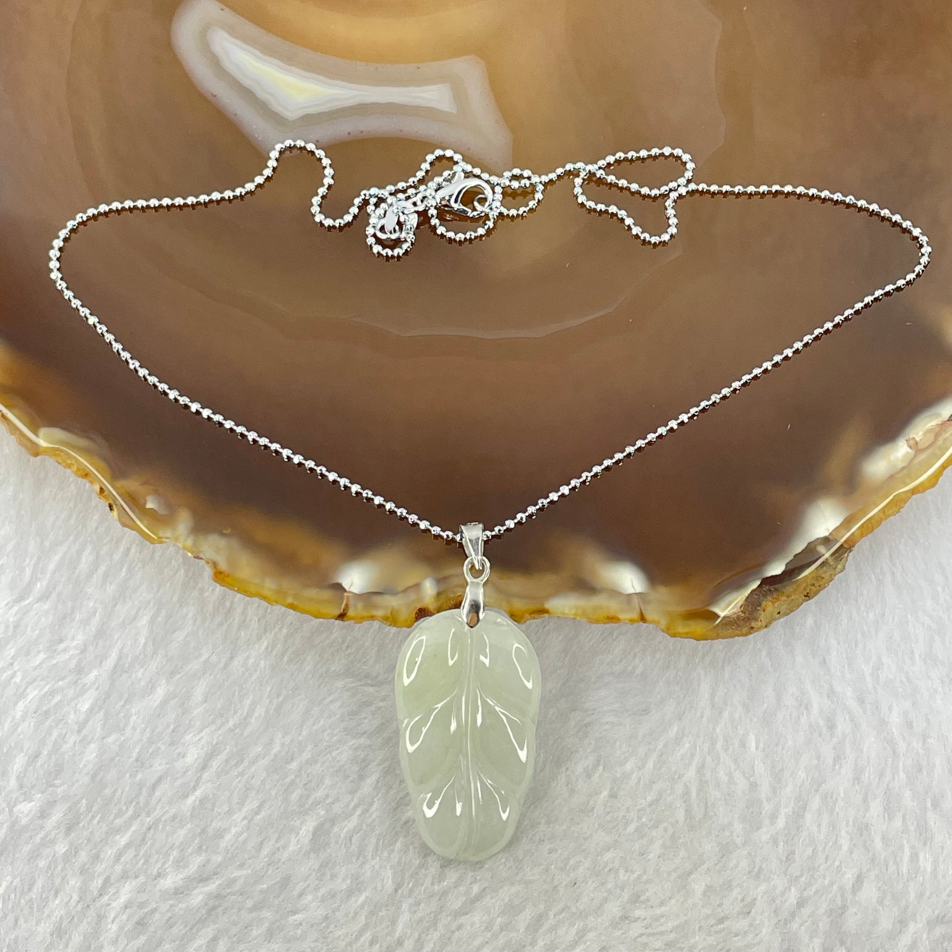 Type A Semi Icy Light Green Jadeite Leaf 30.1 by 17.5 by 3.7mm Pendant with S925 Sliver Necklace 3.80g - Huangs Jadeite and Jewelry Pte Ltd