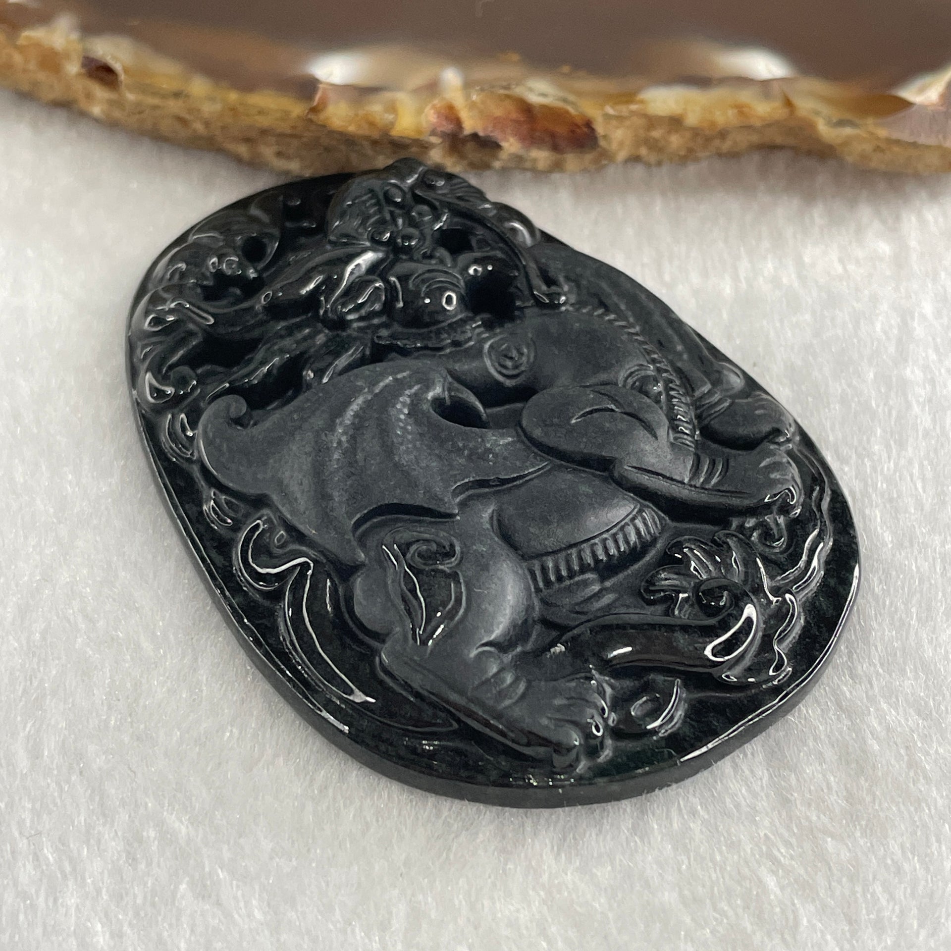 Type A Opaque to Partial Translucent Black Omphacite Jadeite Flying Pixiu Pendant 27.31g 61.2 by 42.5 by 9.3mm - Huangs Jadeite and Jewelry Pte Ltd