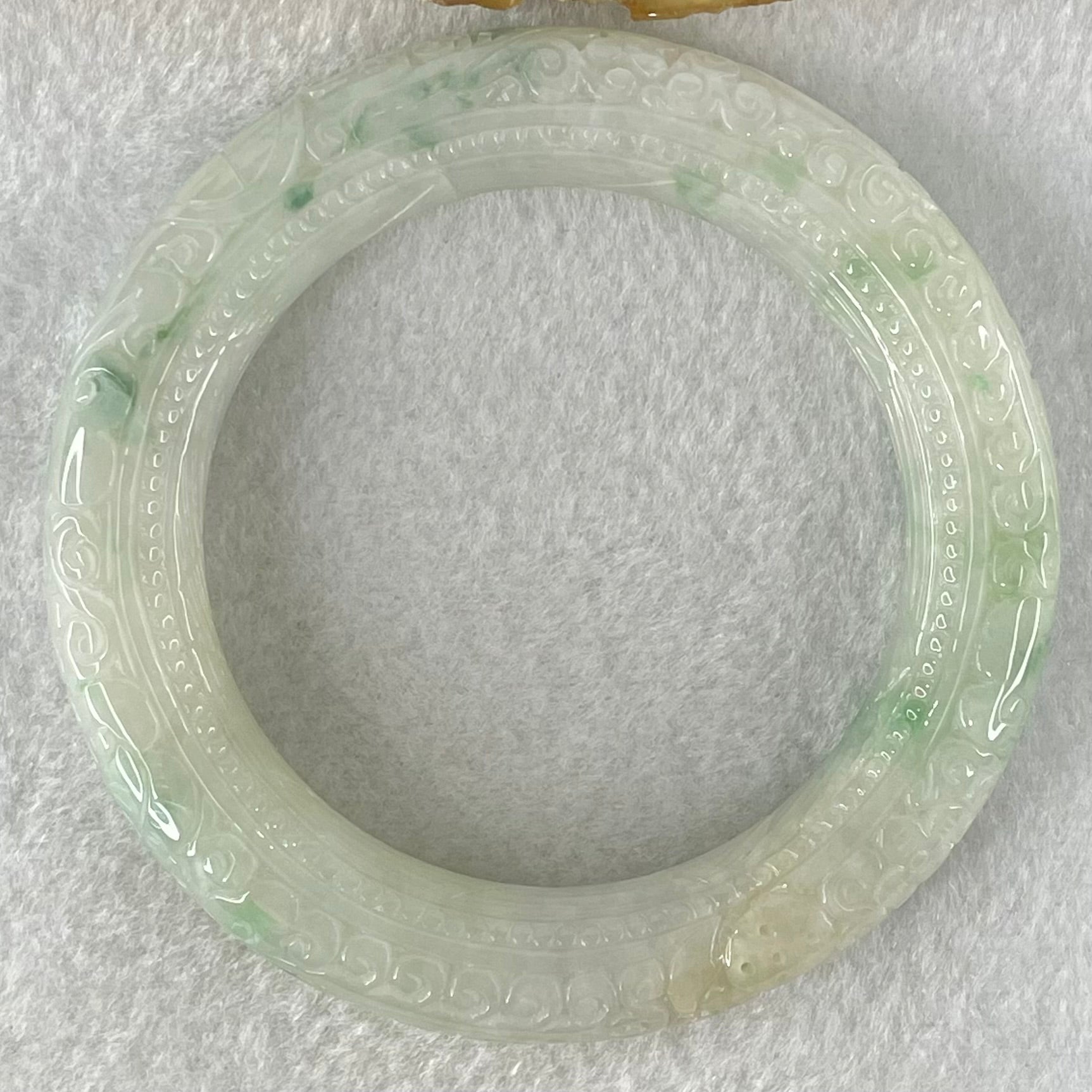 Type A Light Green with Blueish Green Piao Hua Jadeite Carved Floral FU and Ruyi Blessing Bangle 87.62g Internal Diameter 55.7mm 13.0 by 12.7mm (Internal Line) - Huangs Jadeite and Jewelry Pte Ltd