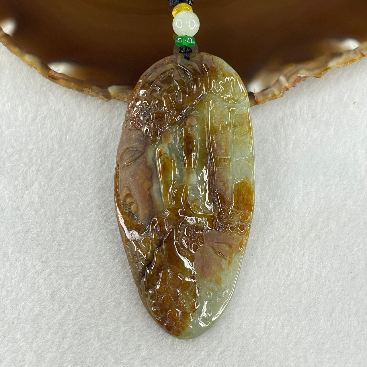 Natural Type A Brown with Light Blueish Green Jadeite Seeking Enlightenment Pendant 57.22g 82.2 by 40.5 by 10.3mm