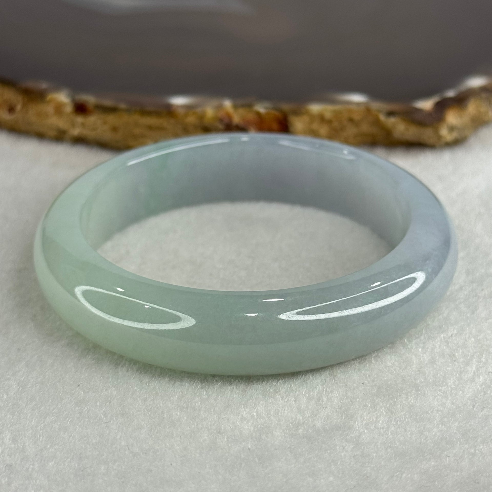 Type A Jelly Faint Green Faint Lavender Jadeite Oval Bangle 48.77g Inner Diameter 57.7mm 12.1 by 8.0mm with NGI Cert No. 32888362 (Internal Line) - Huangs Jadeite and Jewelry Pte Ltd