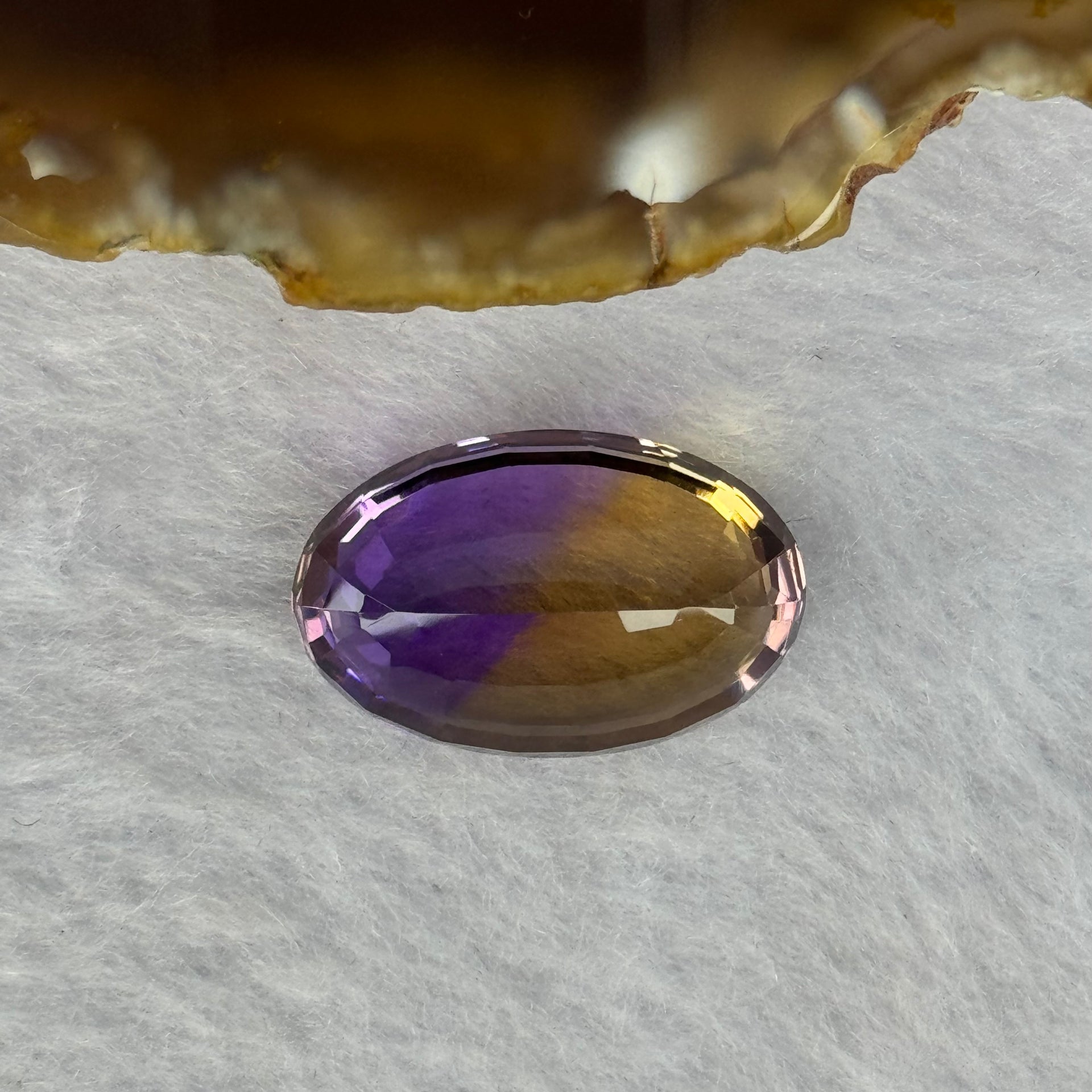 Natural Faceted Ametrine Oval Shape 24.42ct 23.2 by 15.1 by 10.9mm - Huangs Jadeite and Jewelry Pte Ltd