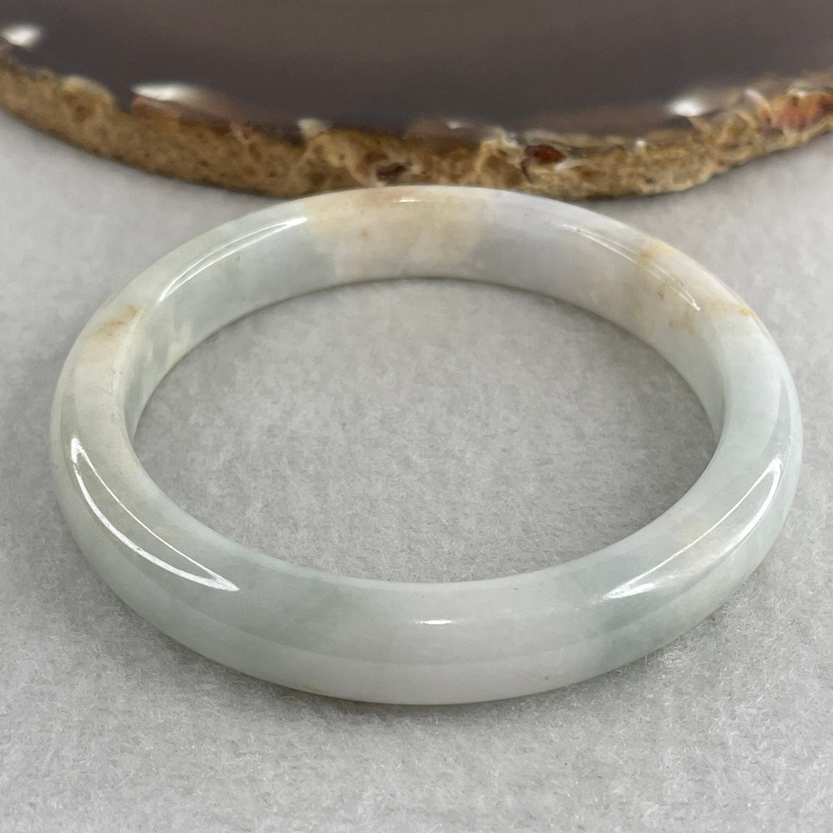 Natural Type A Light Lavender with Green and Brownish Piao Hua Jadeite Flat Ding Dang Bangle 39.14g Inner Diameter 54.5mm 10.2 by 7.2mm (Slight External Rough) - Huangs Jadeite and Jewelry Pte Ltd
