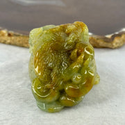 Grand Master Type A Blueish Green with Brownish Yellow Jadeite Dragon on Wealth Pot with Treasures 133.13g 36.0 by 69.3 by 39.5mm - Huangs Jadeite and Jewelry Pte Ltd