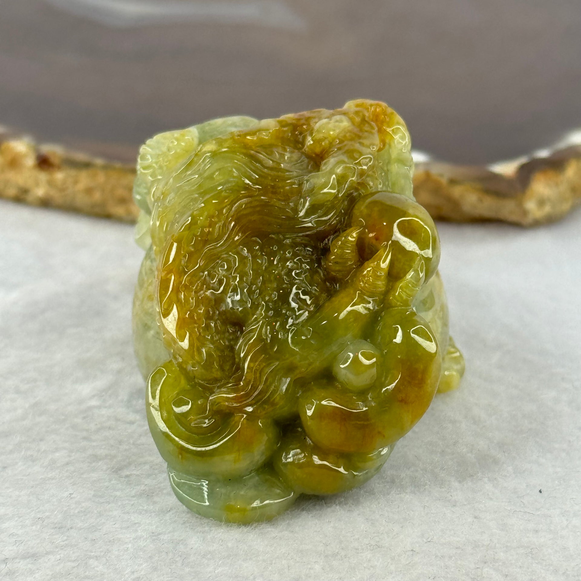 Grand Master Type A Blueish Green with Brownish Yellow Jadeite Dragon on Wealth Pot with Treasures 133.13g 36.0 by 69.3 by 39.5mm - Huangs Jadeite and Jewelry Pte Ltd