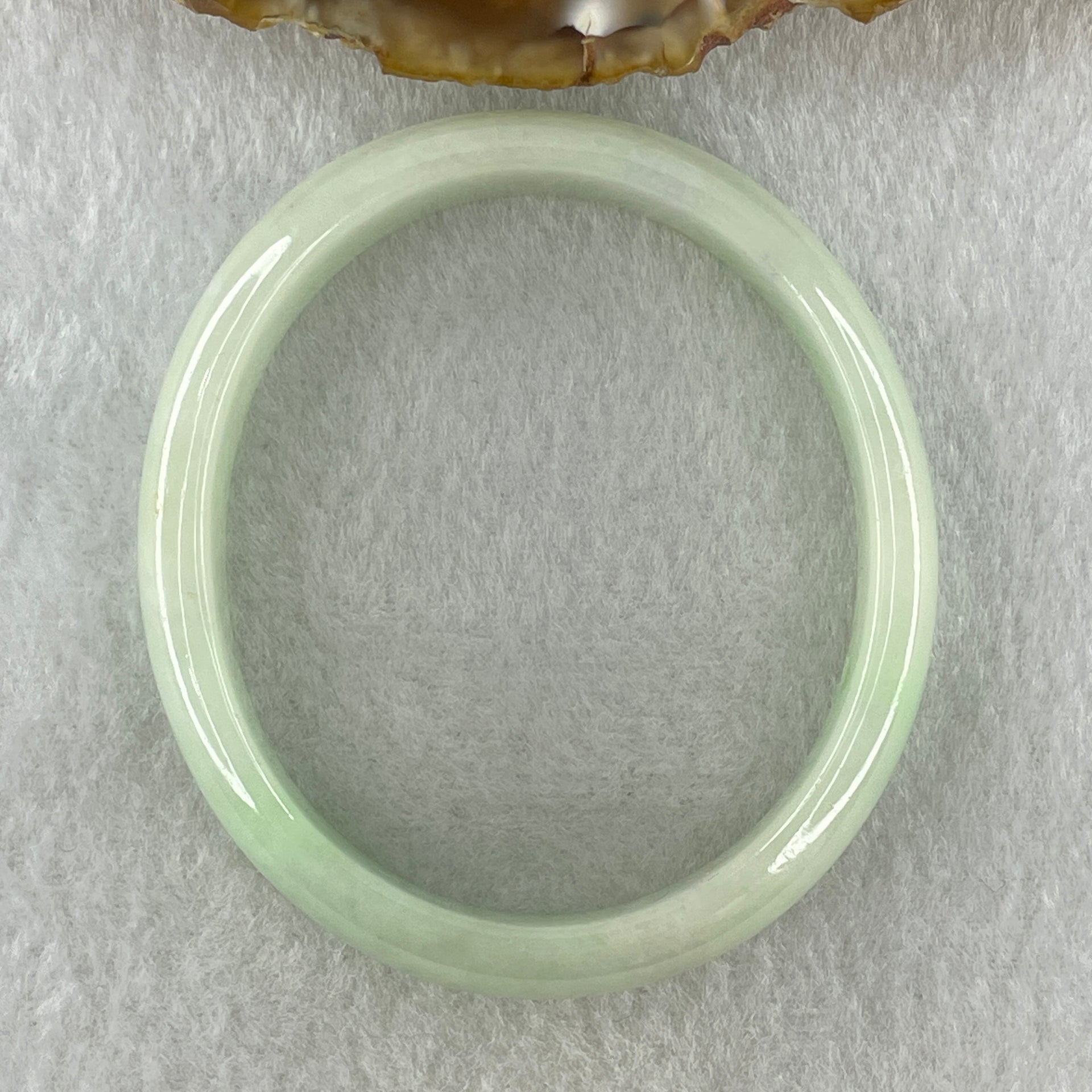 Natural Type A Light Green Jadeite Oval Bangle 36.17g Inner Diameter 54.6mm 12.5 by 6.4mm (Internal Lines) - Huangs Jadeite and Jewelry Pte Ltd