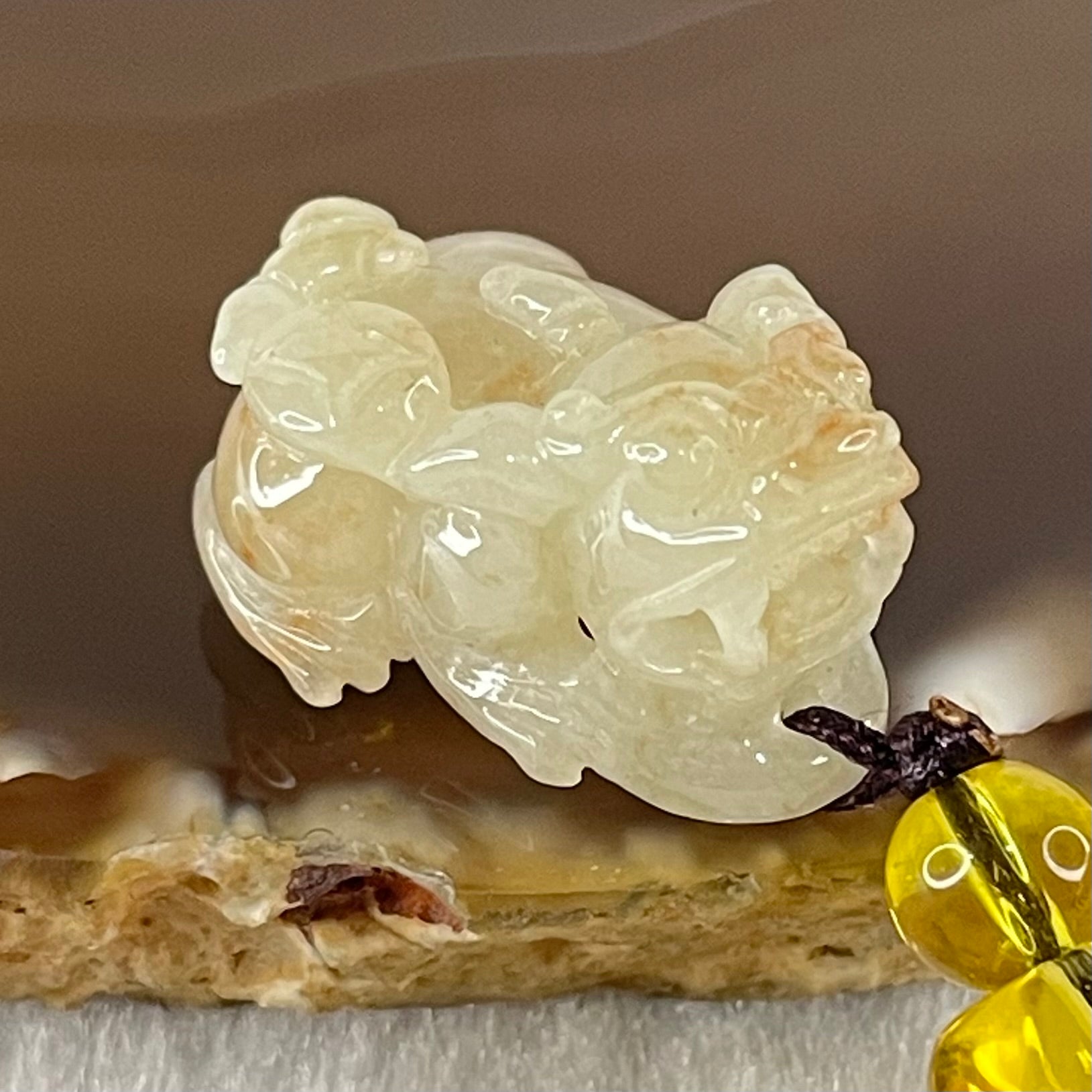 Type A Faint Yellow with Reddish Brown Spots Jadeite Male Pixiu Charm 8.27g 22.5 by 16 by 12.2mm - Huangs Jadeite and Jewelry Pte Ltd