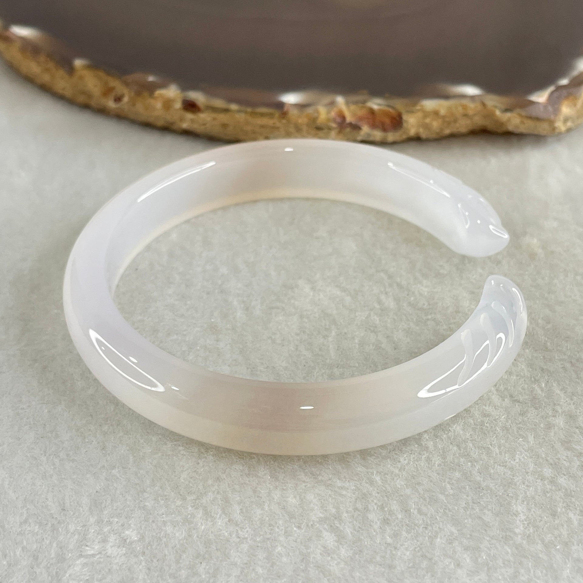 Natural Pinky Agate Fox Bange Internal Dimeter 56.4mm 27.67g 10.2 by 6.9mm - Huangs Jadeite and Jewelry Pte Ltd