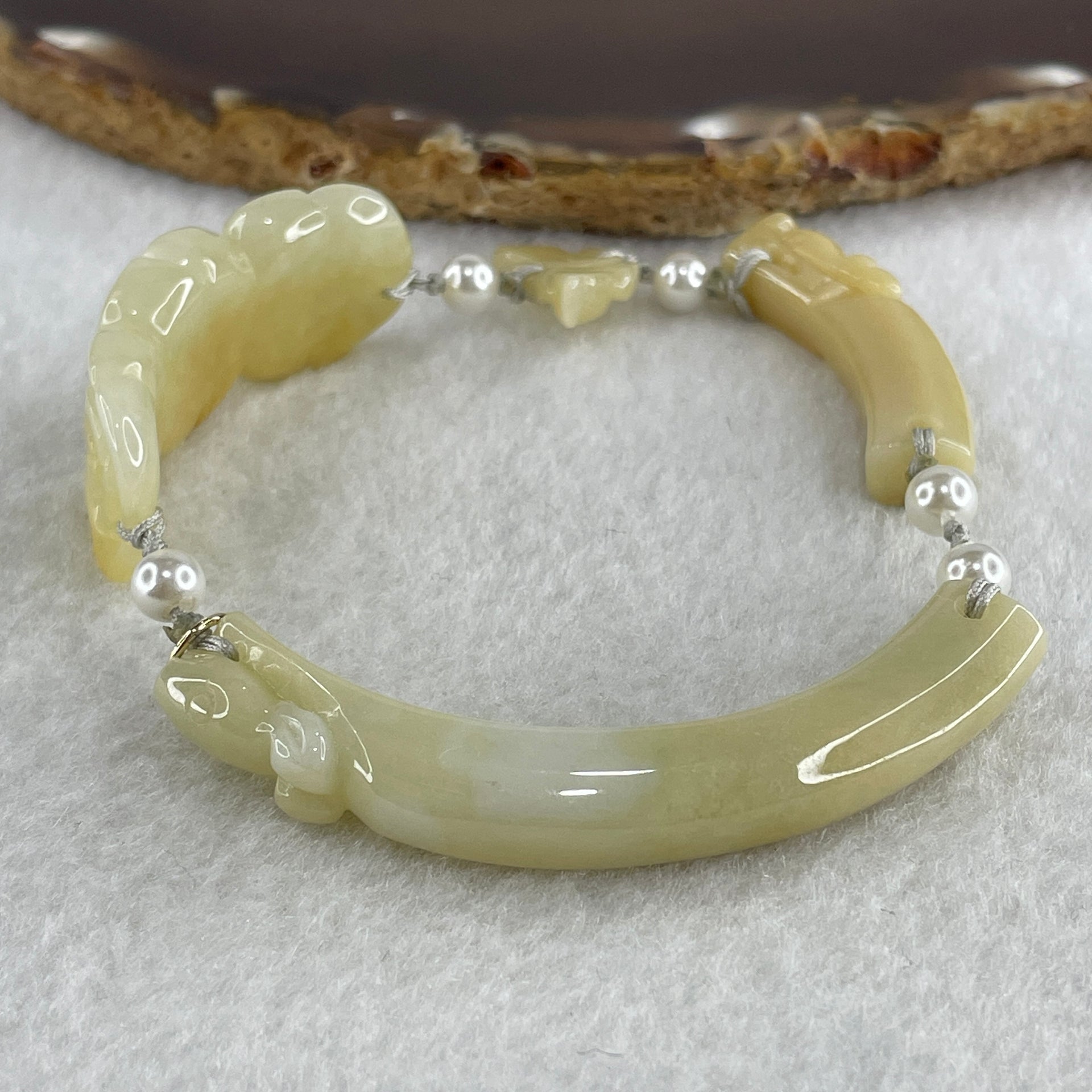 Natural Type A Light Yellowish with Light Green Jadeite Flowers with Dragon Head and Butterfly Bracelet 25.67g 7.2 by 8.4mm - Flower 40.4 by 16.5 by 6.1mm - Huangs Jadeite and Jewelry Pte Ltd