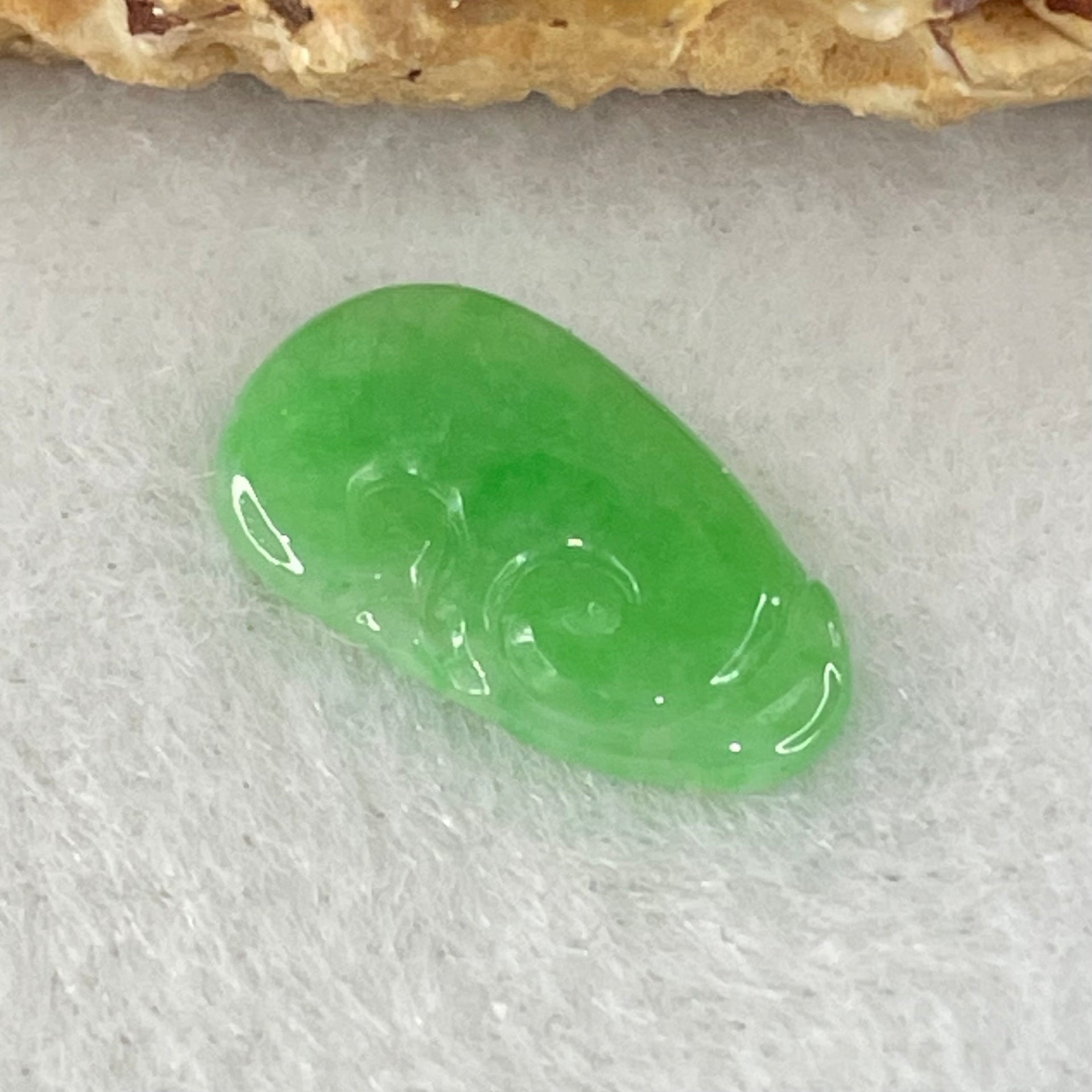 Type A Old Mine Spicy Green Jadeite Ruyi Charm Stone For Setting 0.36g 14.1 by 8.3mm by 1.4mm - Huangs Jadeite and Jewelry Pte Ltd
