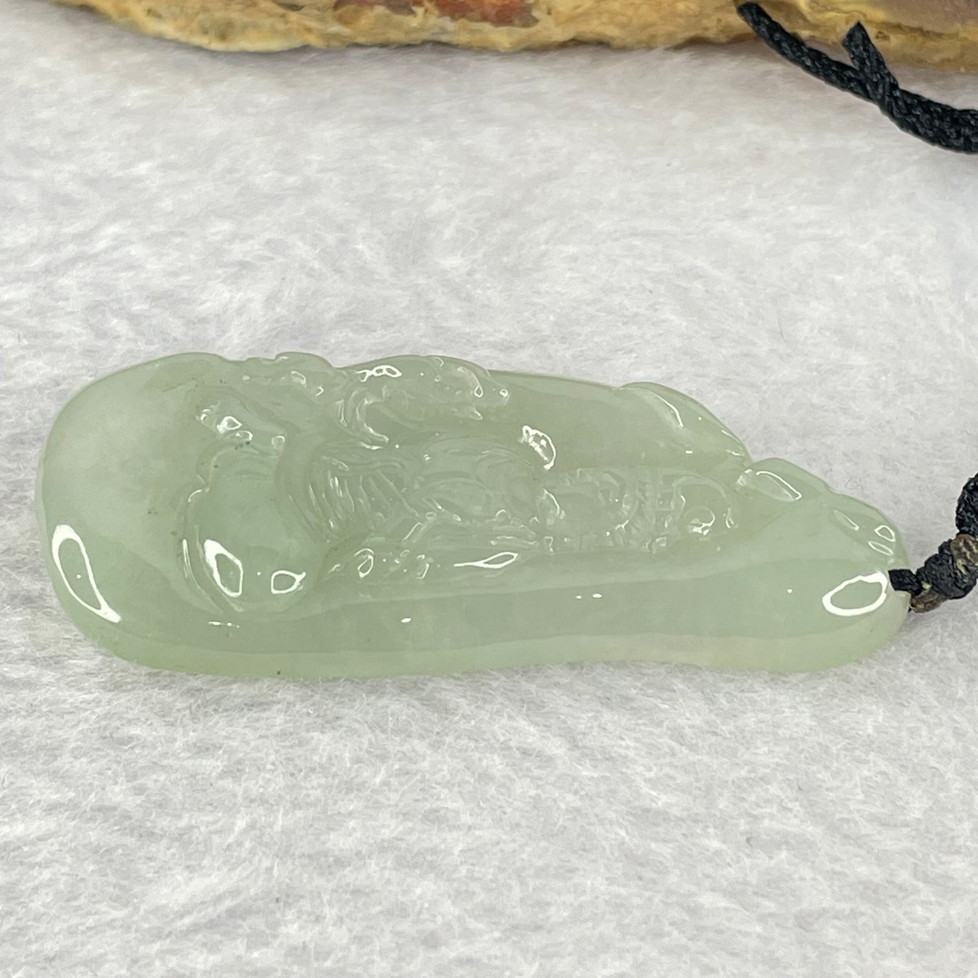 Type A Semi Icy Green Jadeite Guan Yin Pendent 11.98g 48.0 by 21.3 by 5.4mm - Huangs Jadeite and Jewelry Pte Ltd