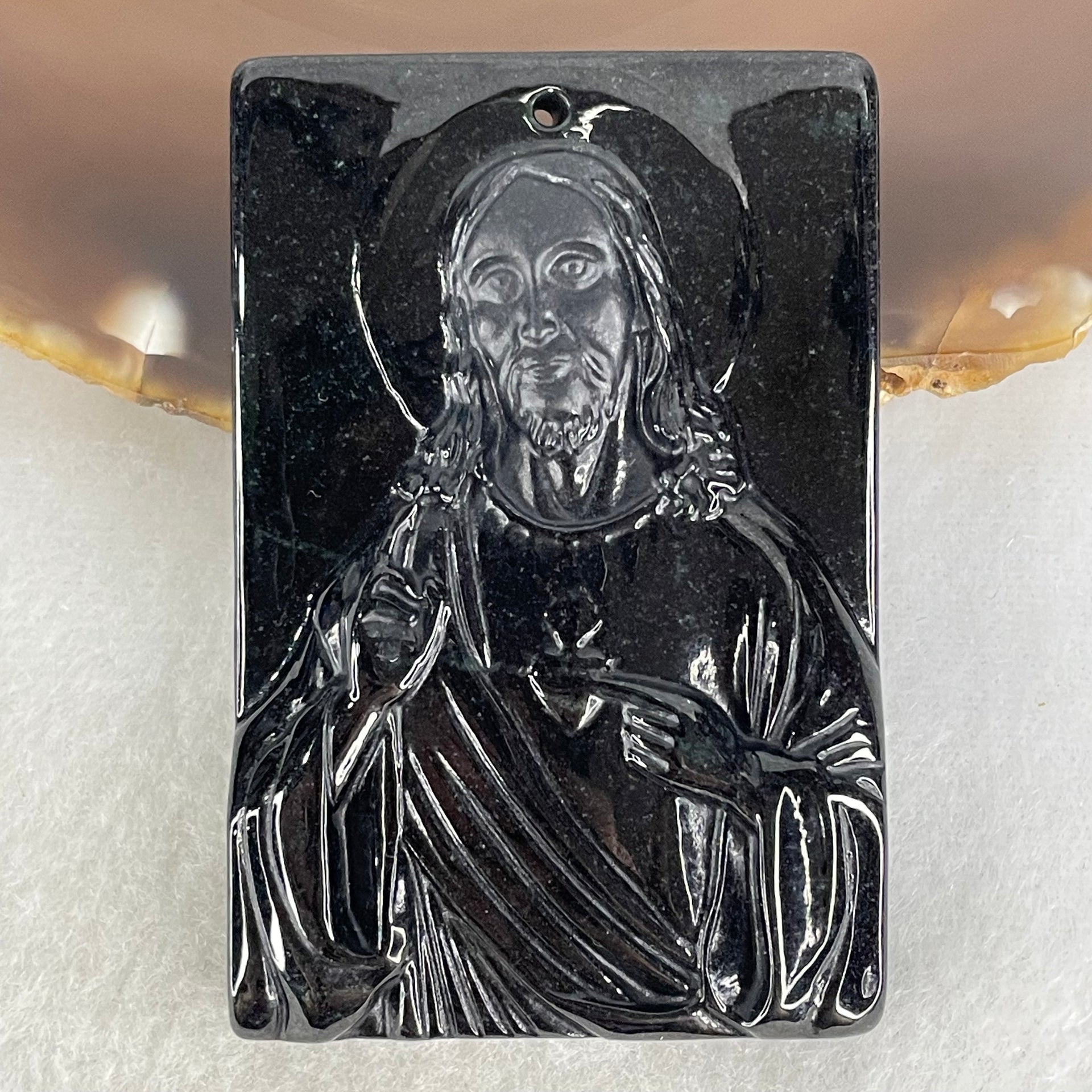 Type A Opaque Black Jadeite Jesus Christ Pendant 45.05g 58.8 by 38.9 by 8.8mm - Huangs Jadeite and Jewelry Pte Ltd