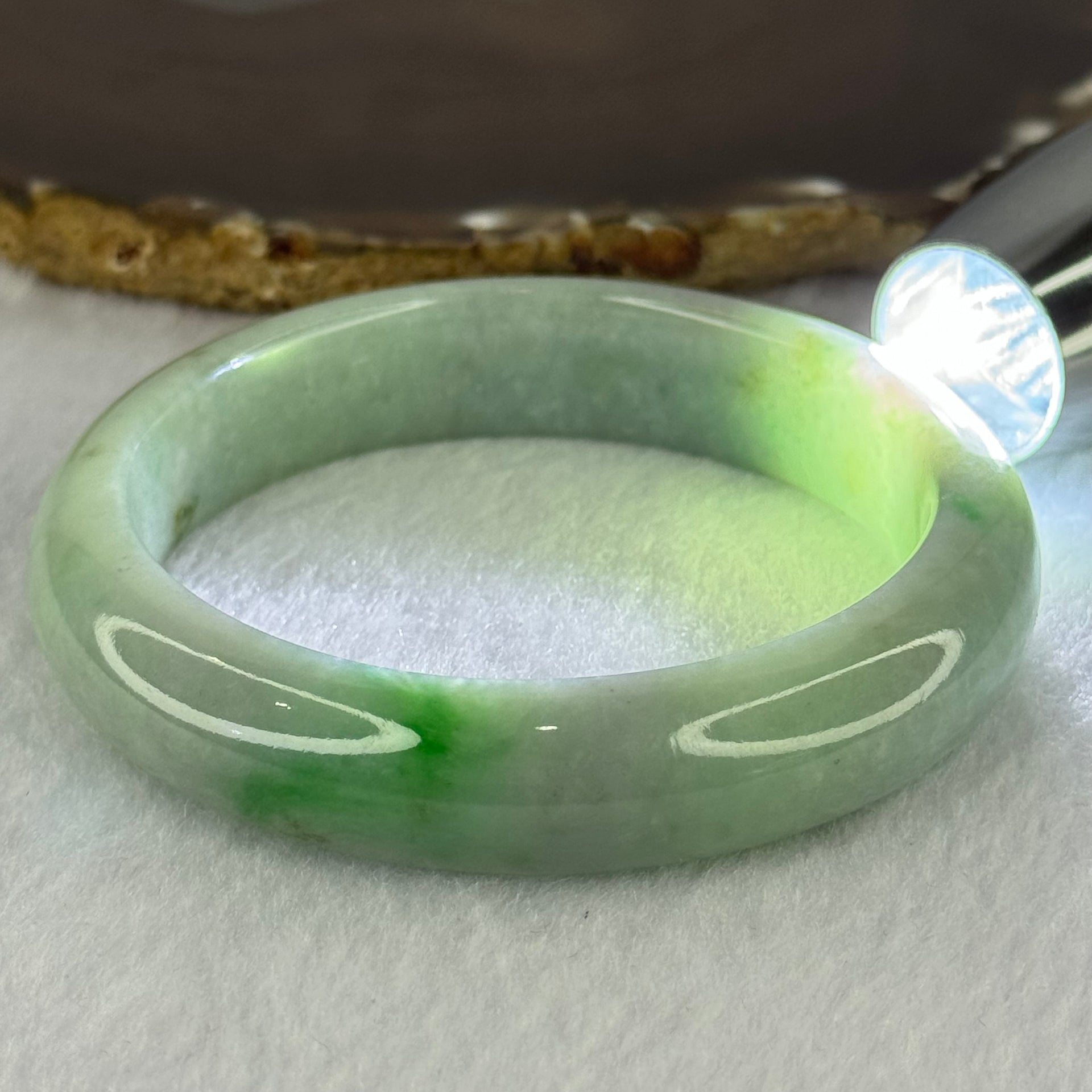 Type A Light Green with Bright Green Patches Jadeite Bangle 78.00g Internal Diameter 61.7mm 14.5 by 9.9mm (Very Slight External Rough) - Huangs Jadeite and Jewelry Pte Ltd