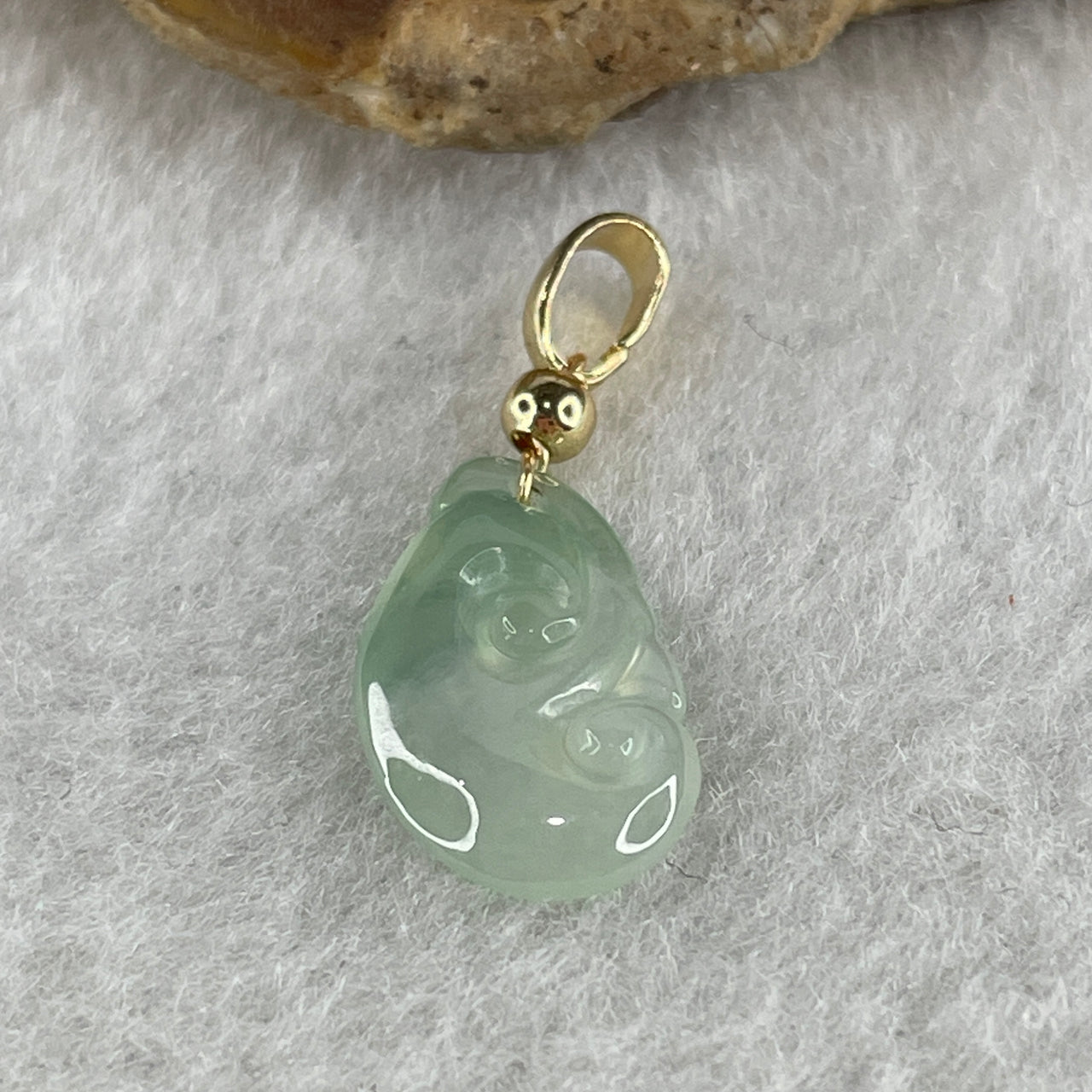 Type A Icy Green with Faint Green Jadeite Ruyi Pendant 0.85g 16.2 by 9.5 by 2.6mm - Huangs Jadeite and Jewelry Pte Ltd