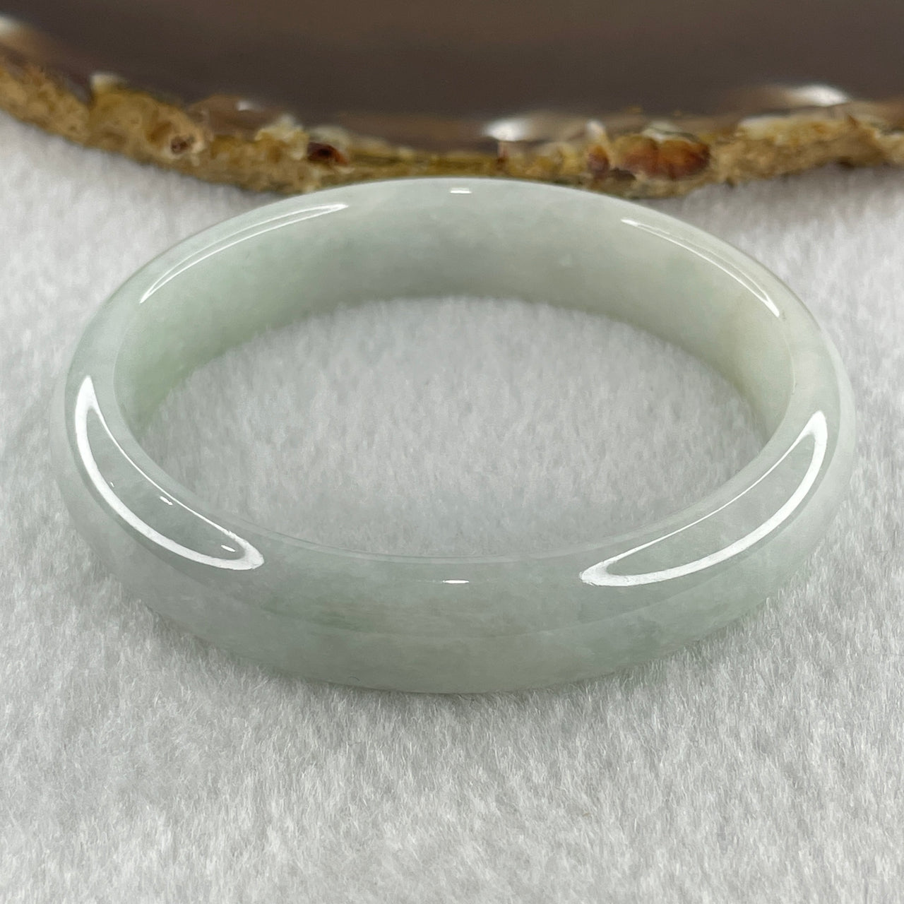 Natural Type A Faint Green Faint Lavender Jadeite Oval Bangle 42.10g Inner Diameter 55.2mm 12.8 by 7.4mm (Very Very Slight Internal Lines) - Huangs Jadeite and Jewelry Pte Ltd