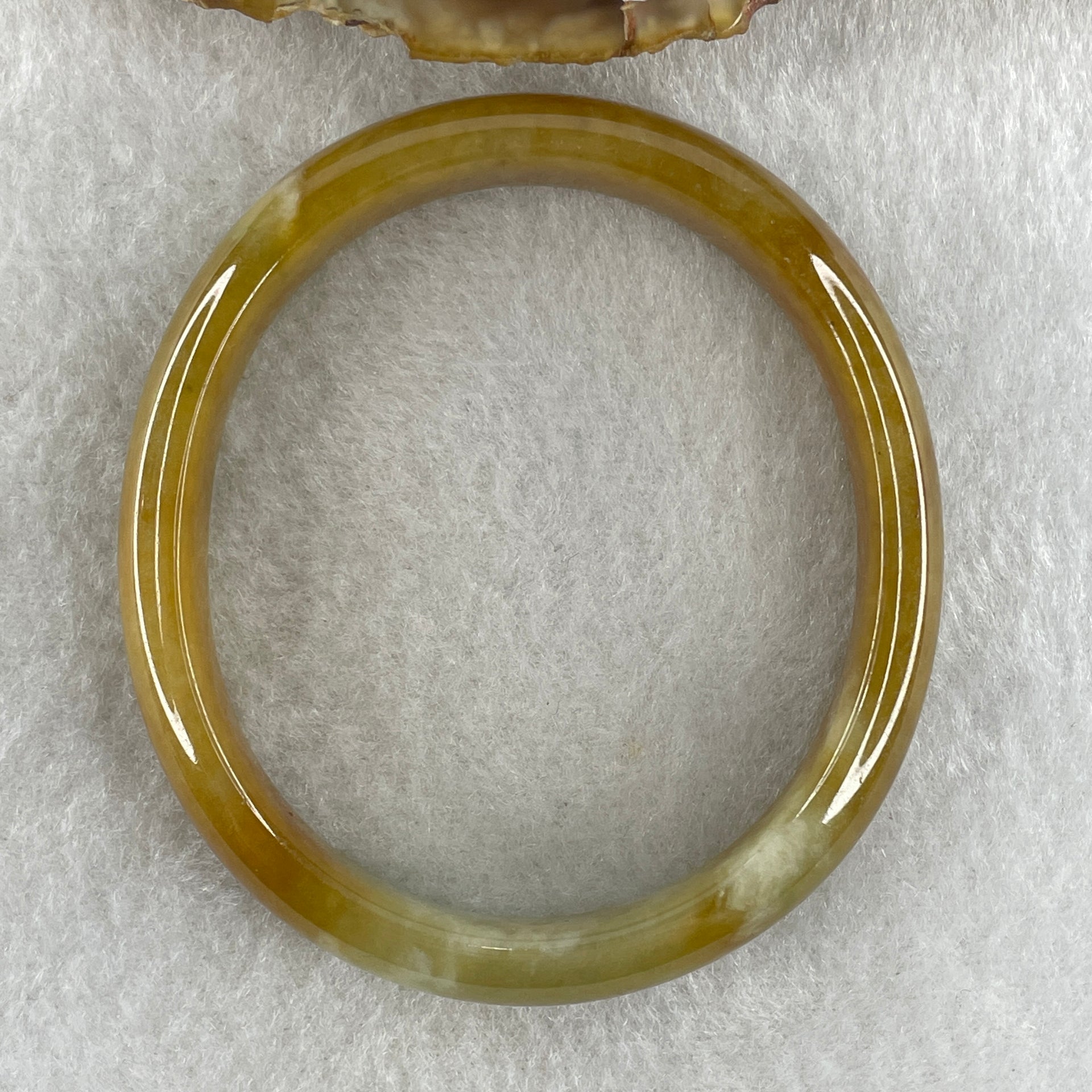 Type A Natural Intense Brownish Yellow Jadeite Oval Bangle 30.33g Inner Diameter 52.7mm 11.0 by 6.5mm (Very Slight Internal Lines) - Huangs Jadeite and Jewelry Pte Ltd