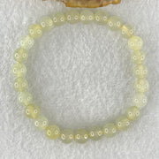 Type A Semi Icy Light Yellowish Blueish Green Jadeite Beads Bracelet 13.73g 14.5cm 6.8mm 27 Beads - Huangs Jadeite and Jewelry Pte Ltd