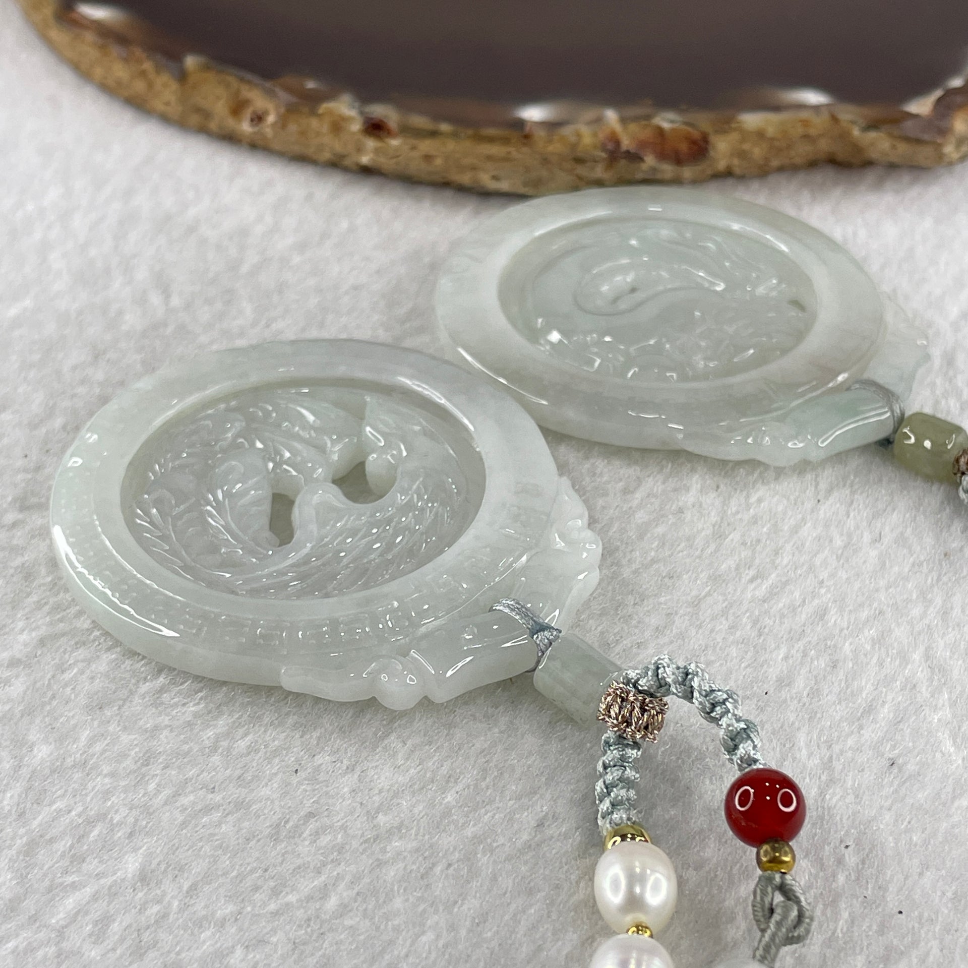Grand Master Natural Colorless to Fain Green Jadeite Dragon and Phoenix Pendant 60.88g 54.8 by 47.9 by 6.0mm - Huangs Jadeite and Jewelry Pte Ltd