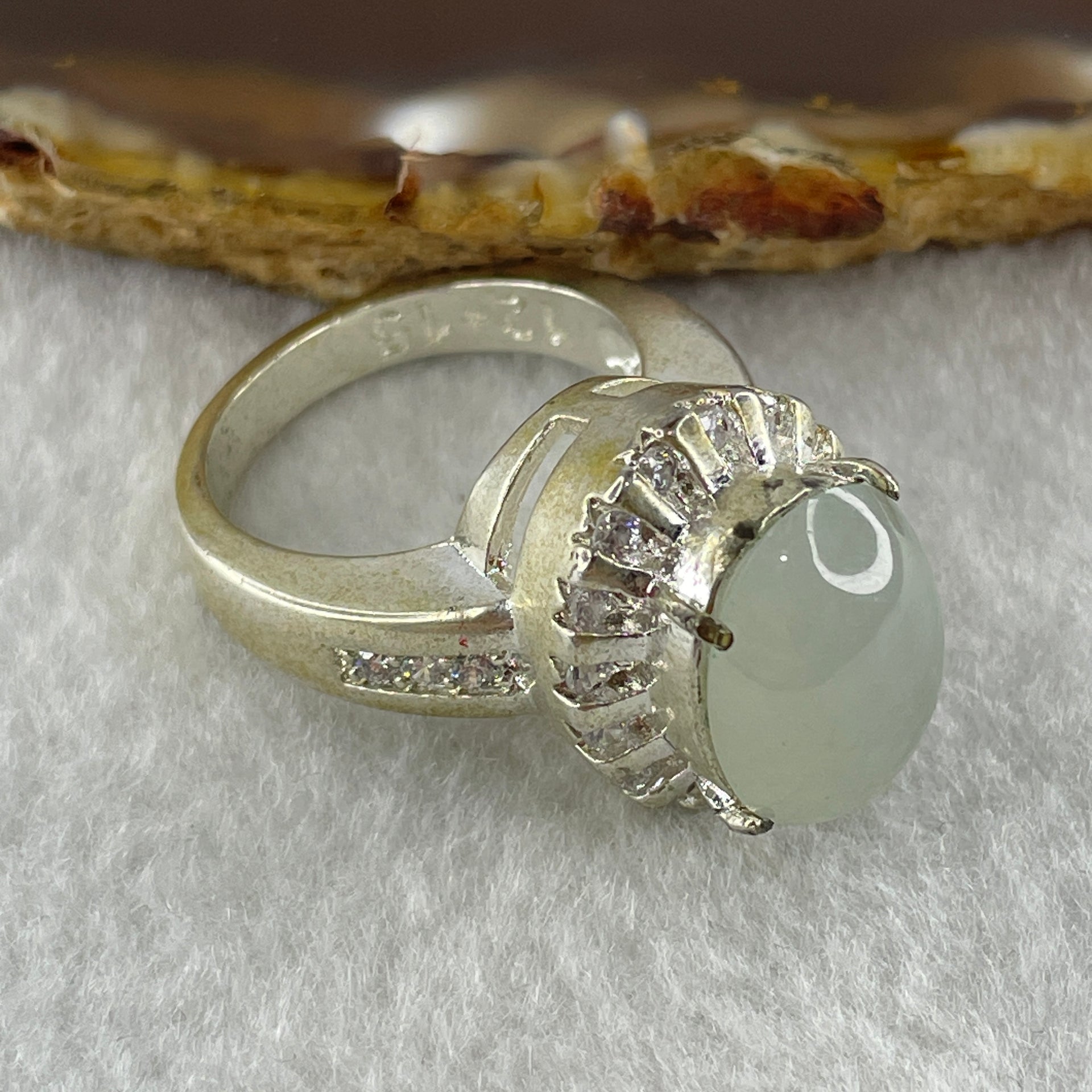 Type A Natural White to Faint Green Jadeite Cabochon 14.5 by 11.7 by 4.0mm Stone for Setting 15.72g (On Silver Ring Mold) US 8.75 HK 19.5 - Huangs Jadeite and Jewelry Pte Ltd