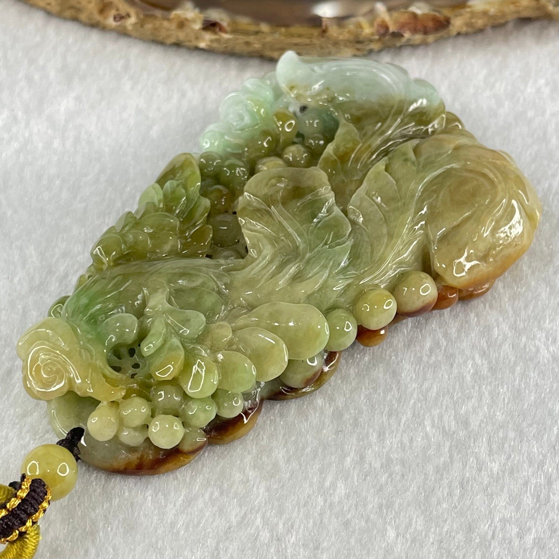Grandmaster Type A Brownish Green and Faint Lavender Green Jadeite Double Sided Phoenix and Flower Pendant 凤戏牡丹 93.05g 79 by 50.6 by 13mm - Huangs Jadeite and Jewelry Pte Ltd