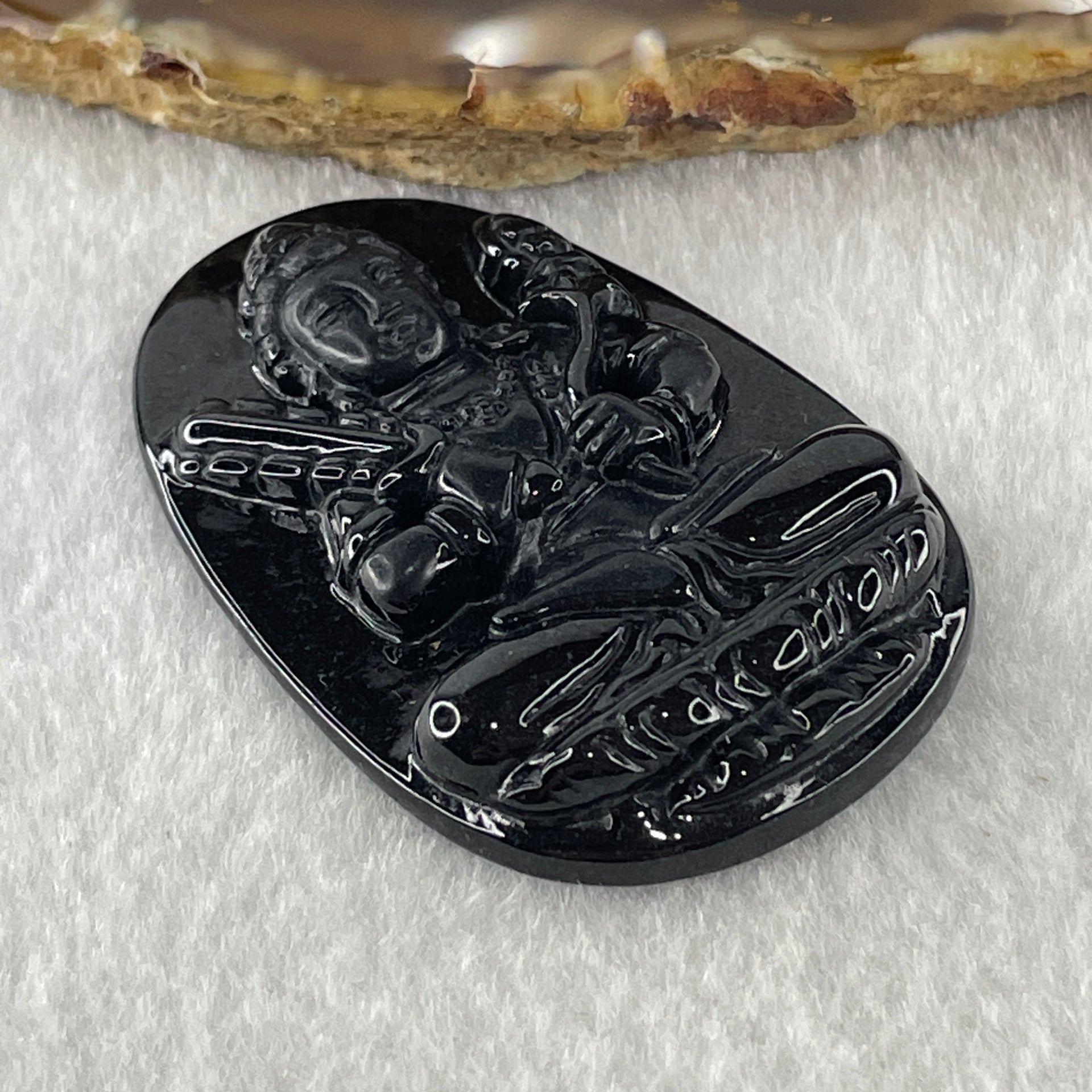 Type A Opaque to Partial Translucent Black Omphacite Jadeite Akasagarbha Bodhissattva Pendant Ox and Tiger Zodiac Guardian 17.04g 52.7 by 34.2 by 7.4mm - Huangs Jadeite and Jewelry Pte Ltd