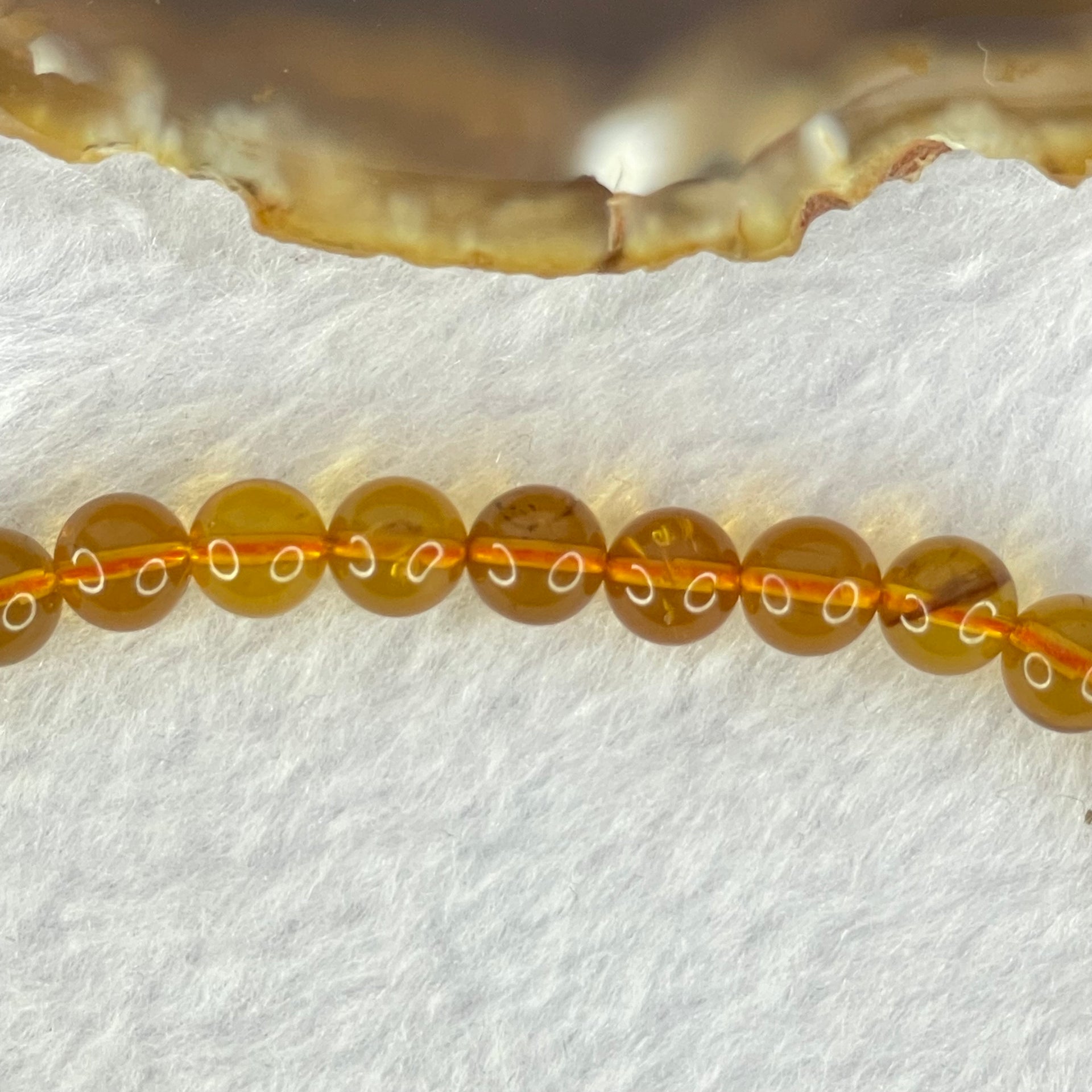 Natural Gold Yellow Amber Elastic Necklace 天然黄琥珀项链 9.24g 32cm 6.7mm 59 Beads - Huangs Jadeite and Jewelry Pte Ltd